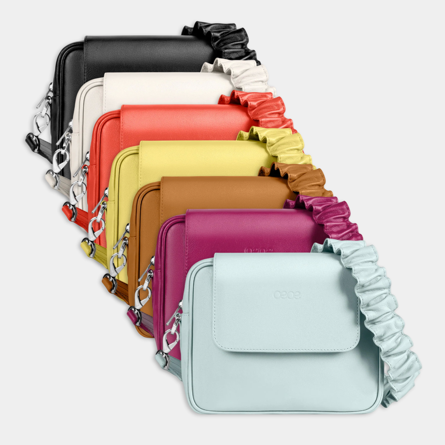 Bandolera pequeña en piel de vacuno en color azul (celeste) para mujer