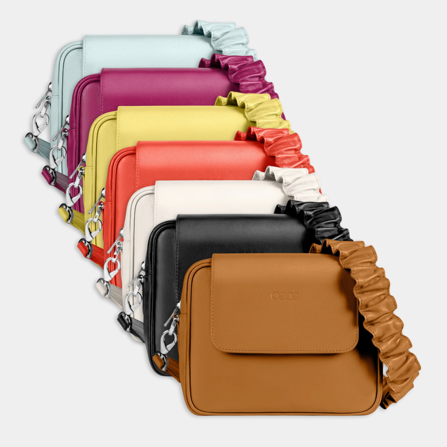 Bandolera pequeña en piel de vacuno en color camel para mujer