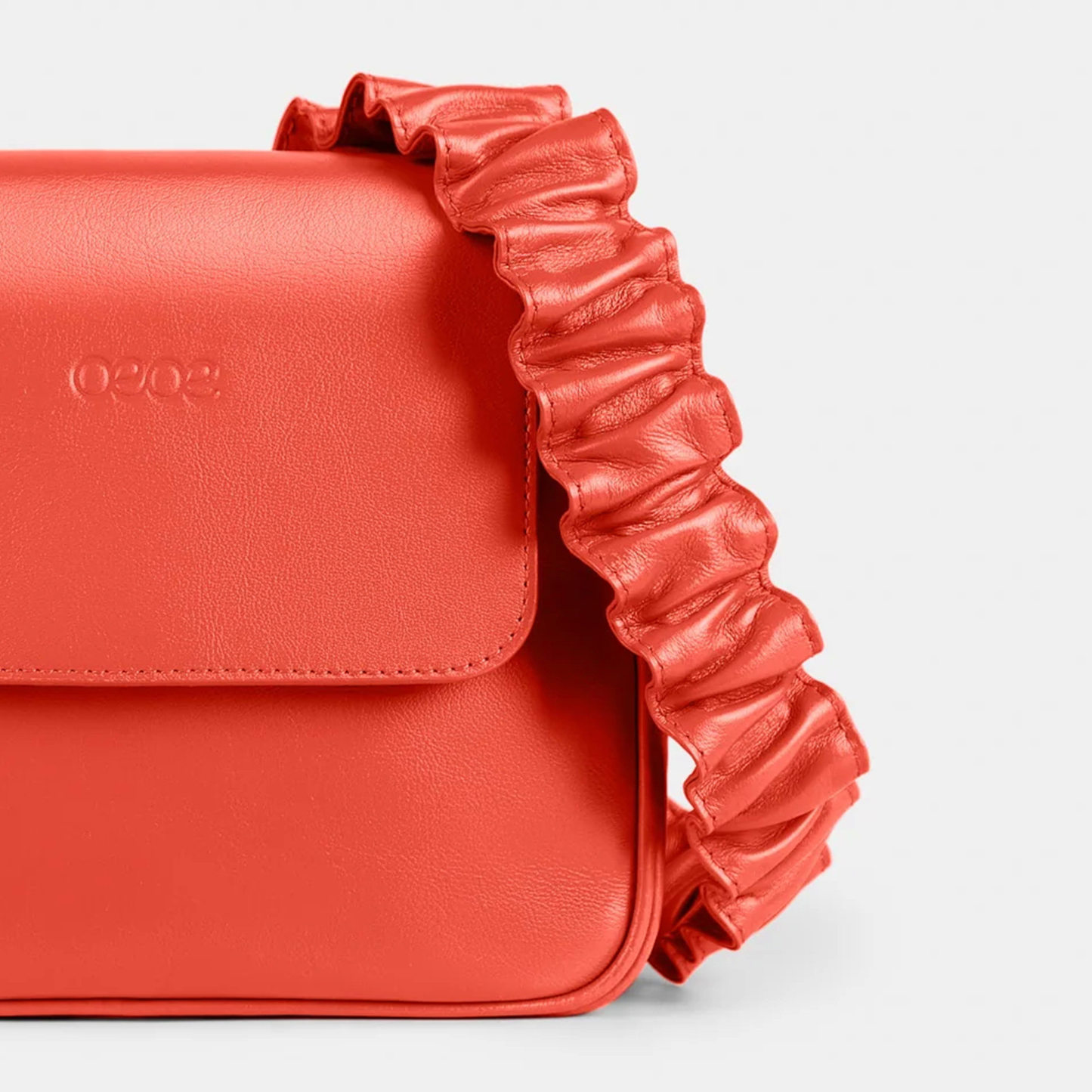 Bandolera pequeña en piel de vacuno en color naranja para mujer