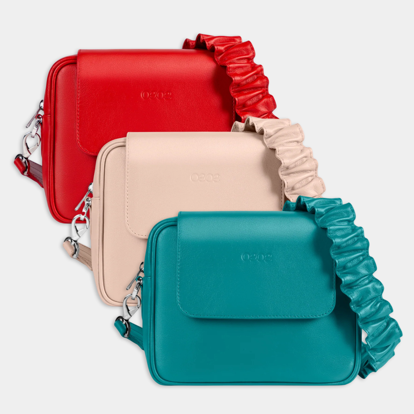 Bandolera pequeña en piel de vacuno en color turquesa para mujer