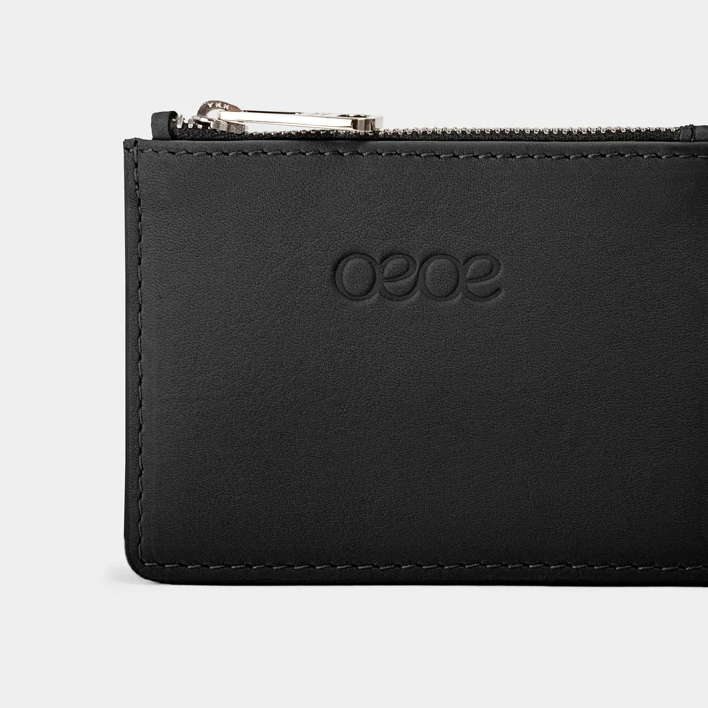 Cartera pequeña en piel de vacuno en color negro para mujer