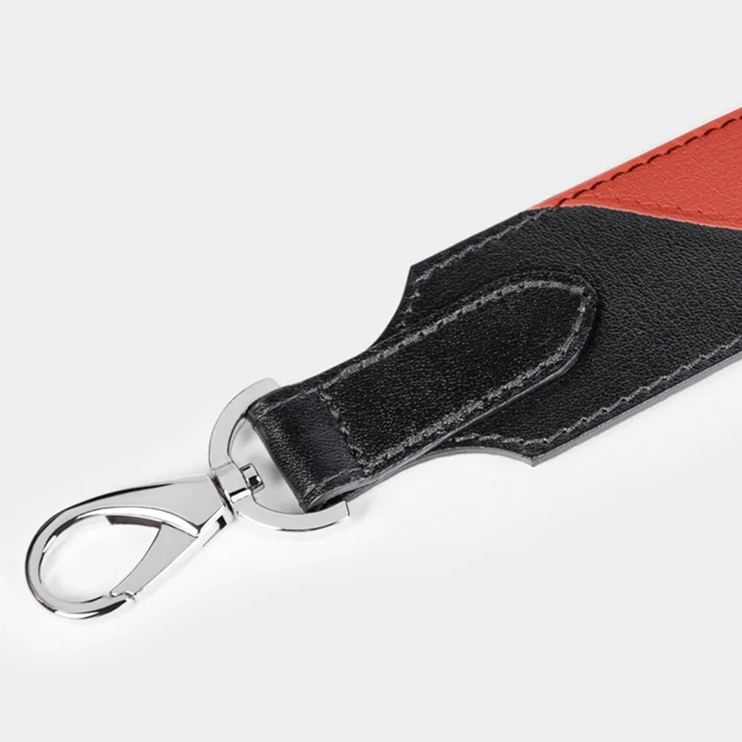 Correa Bolso en piel de vacuno en color negra/naranja para hombre