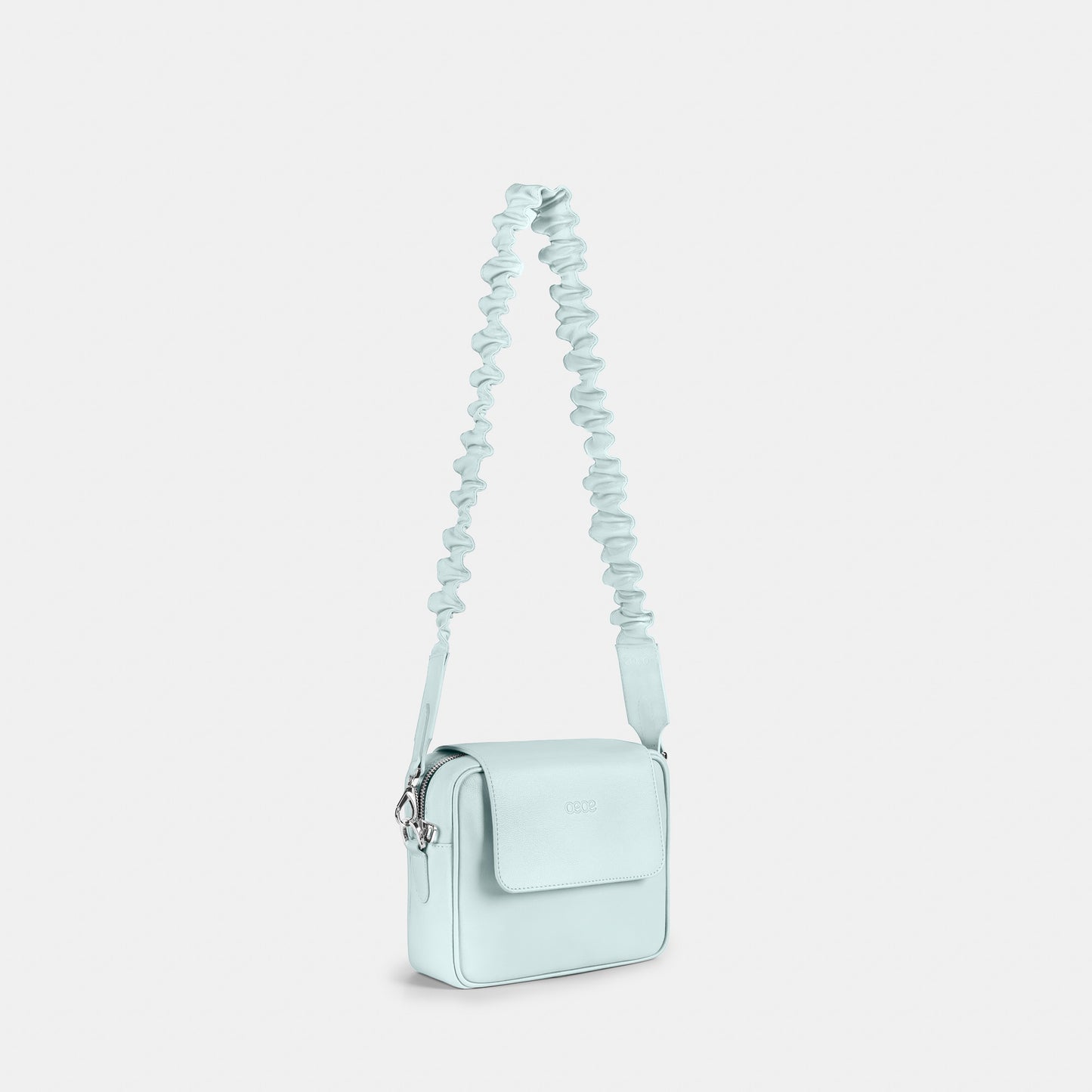 Bandolera pequeña en piel de vacuno en color azul (celeste) para mujer