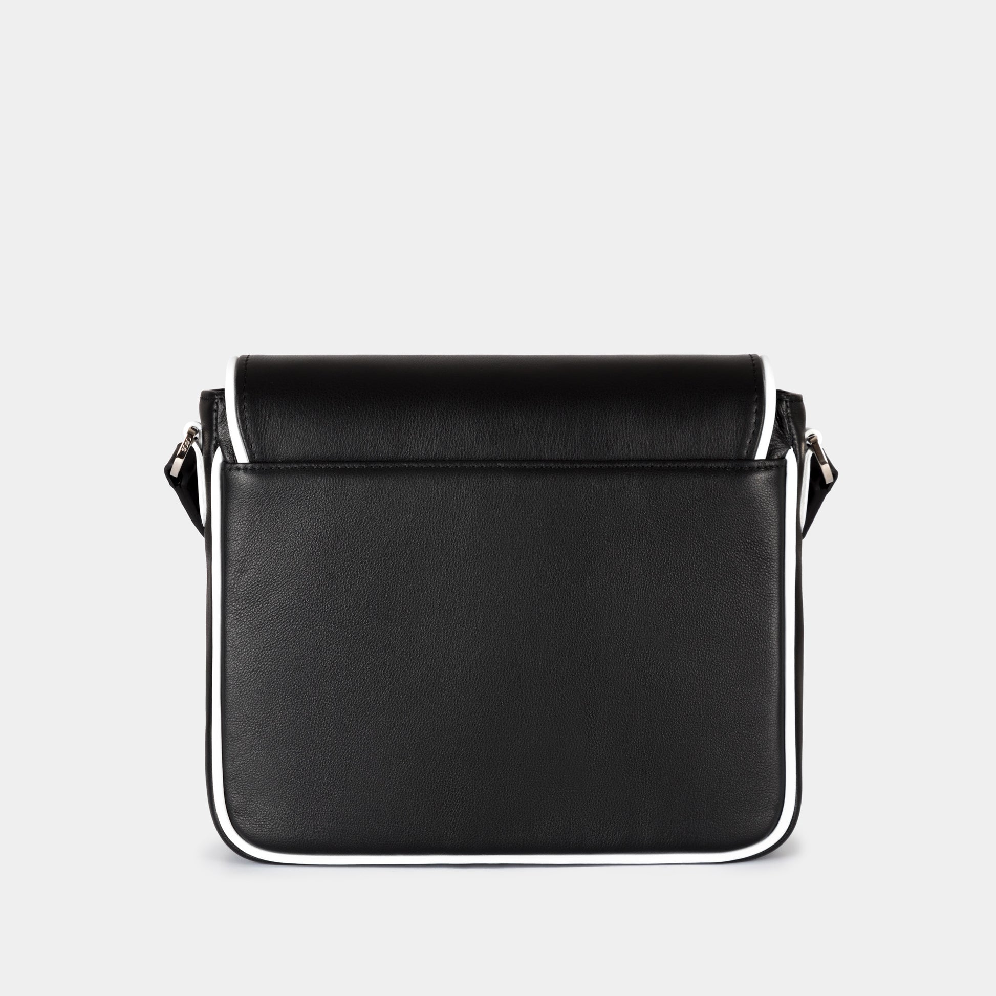 Bandolera pequeña en piel de vacuno  en color blanco/negro para mujer