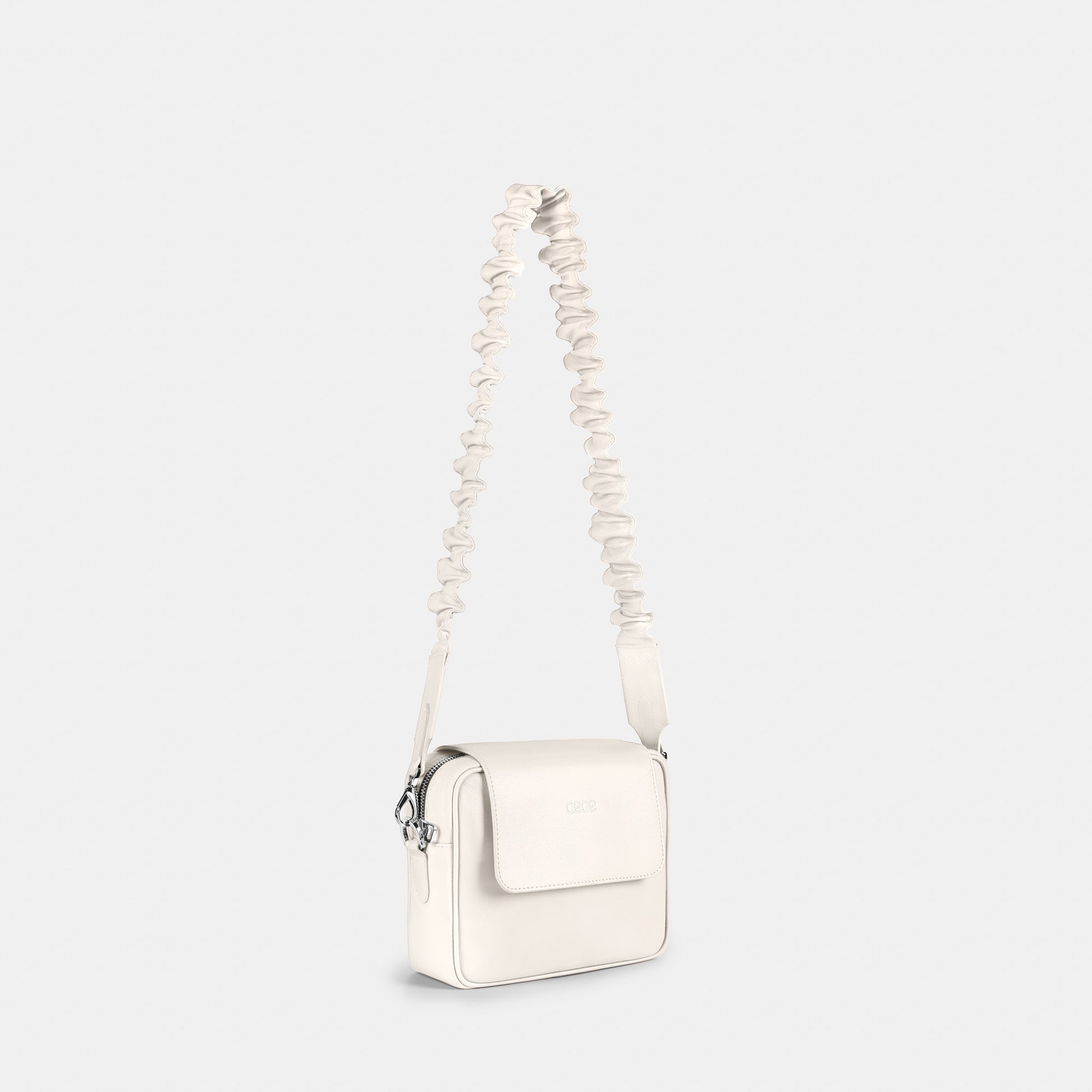 Bandolera pequeña en piel de vacuno en color blanco  para mujer