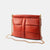 Bolso Clutch pequeño en piel de cordero en color naranja para mujer