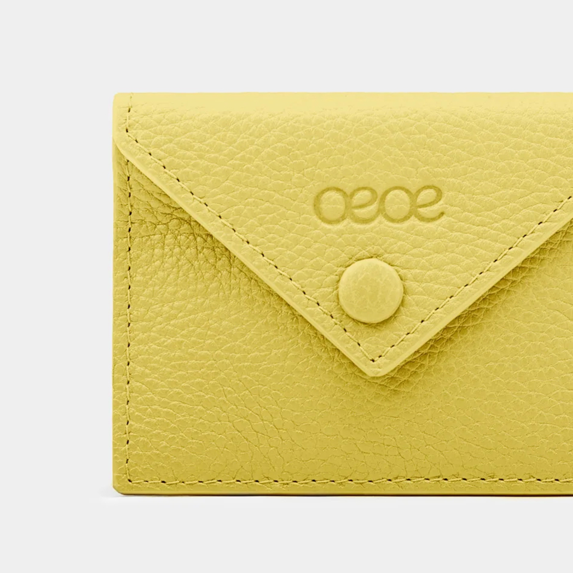 Cartera pequeña en piel de vacuno en color amarillo para mujer
