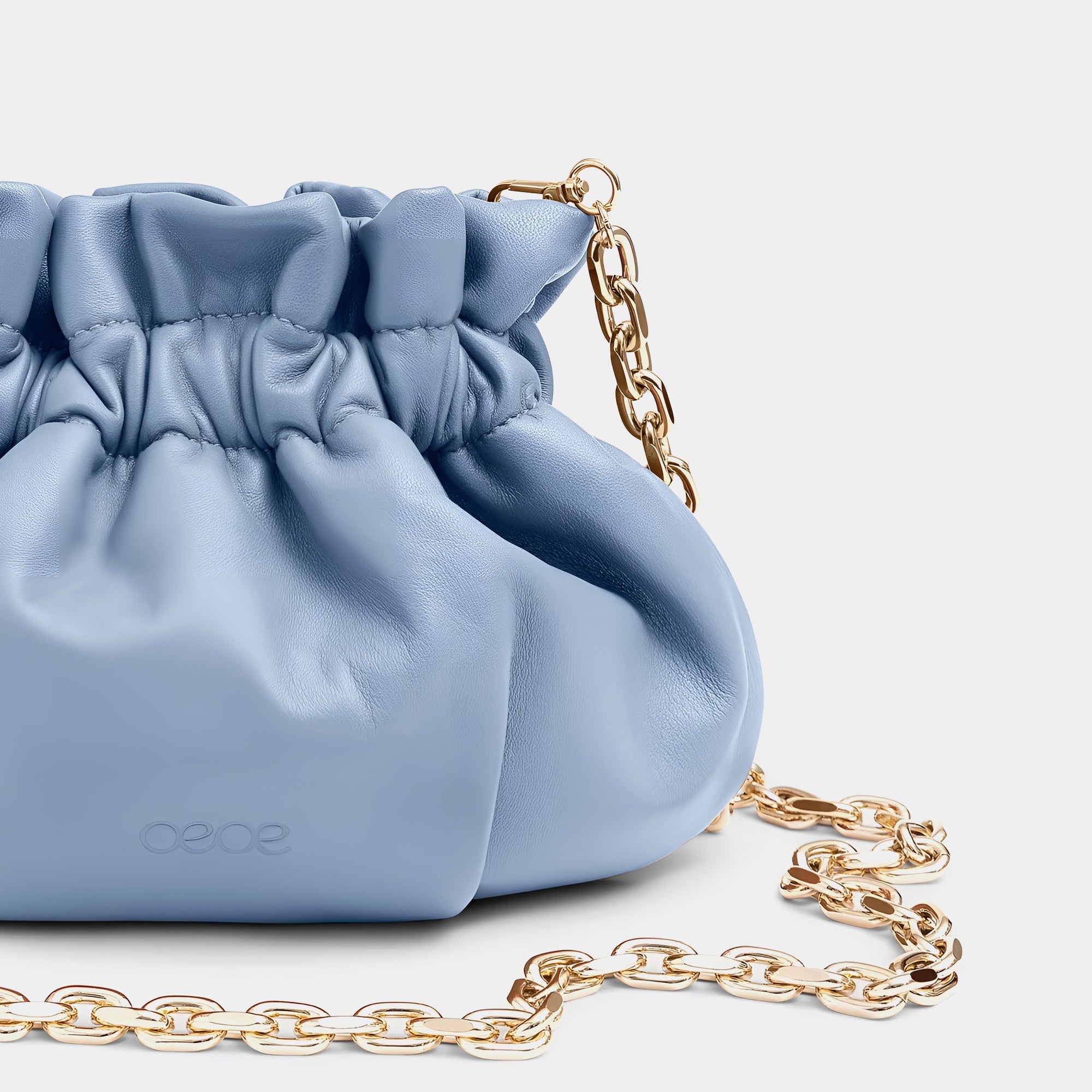 Minibolso pequeño en piel de cordero en color azul para mujer