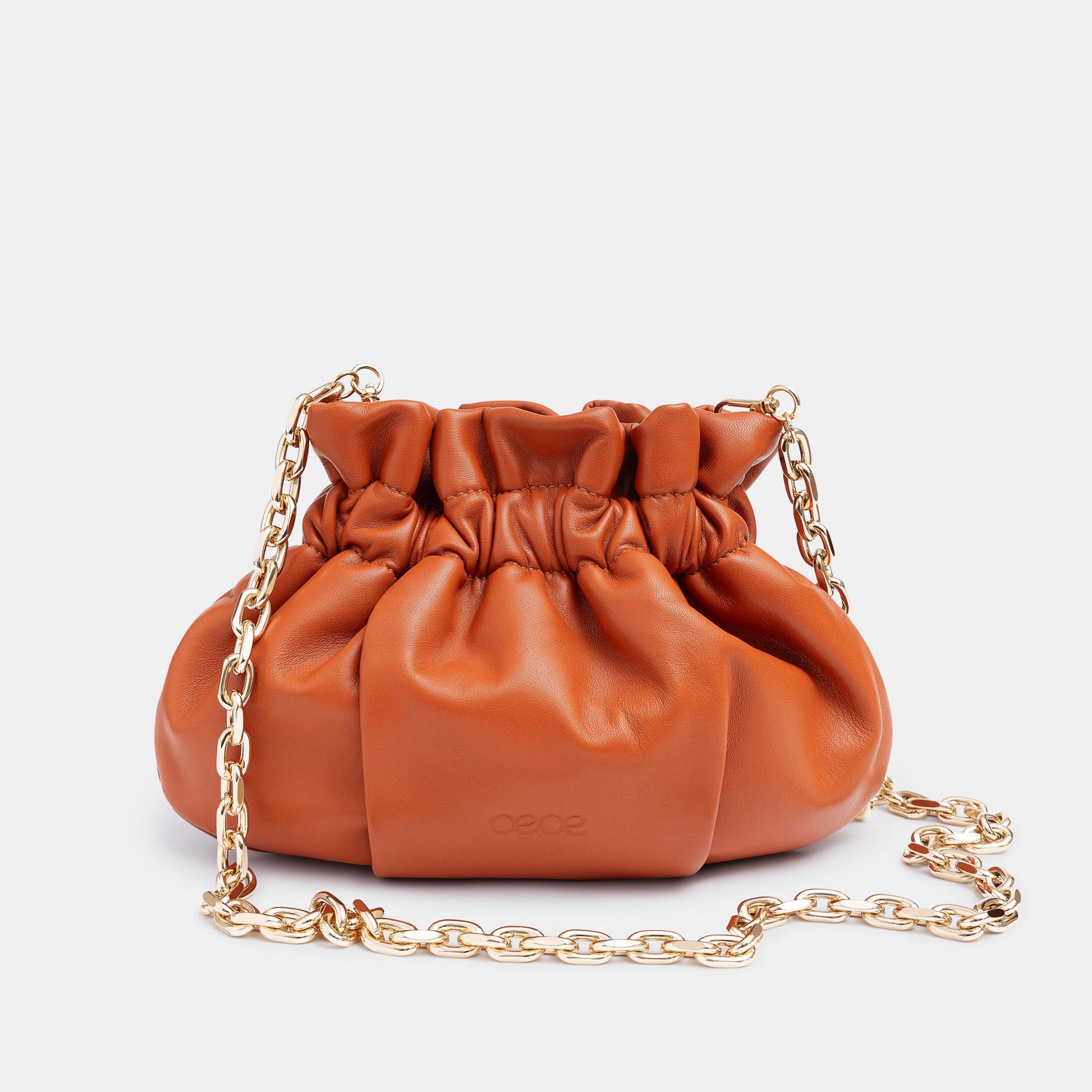 Minibolso pequeño en piel de cordero  en color naranja para mujer