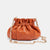 Minibolso pequeño en piel de cordero  en color naranja para mujer