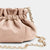 Minibolso pequeño en piel de cordero en color rosa para mujer