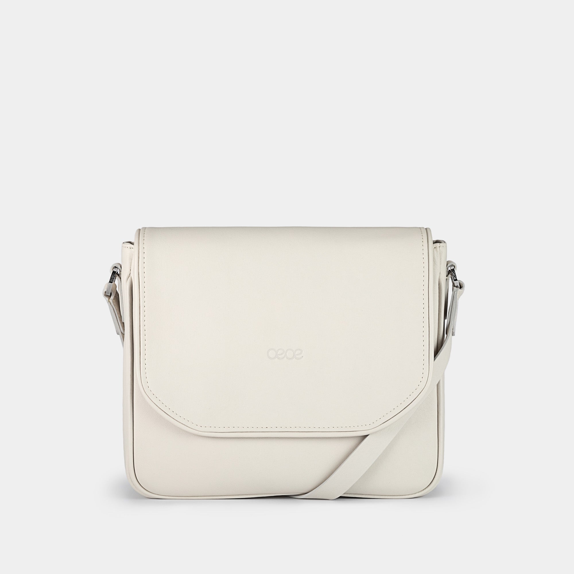 Bandolera pequeña en piel de vacuno en color blanco para mujer