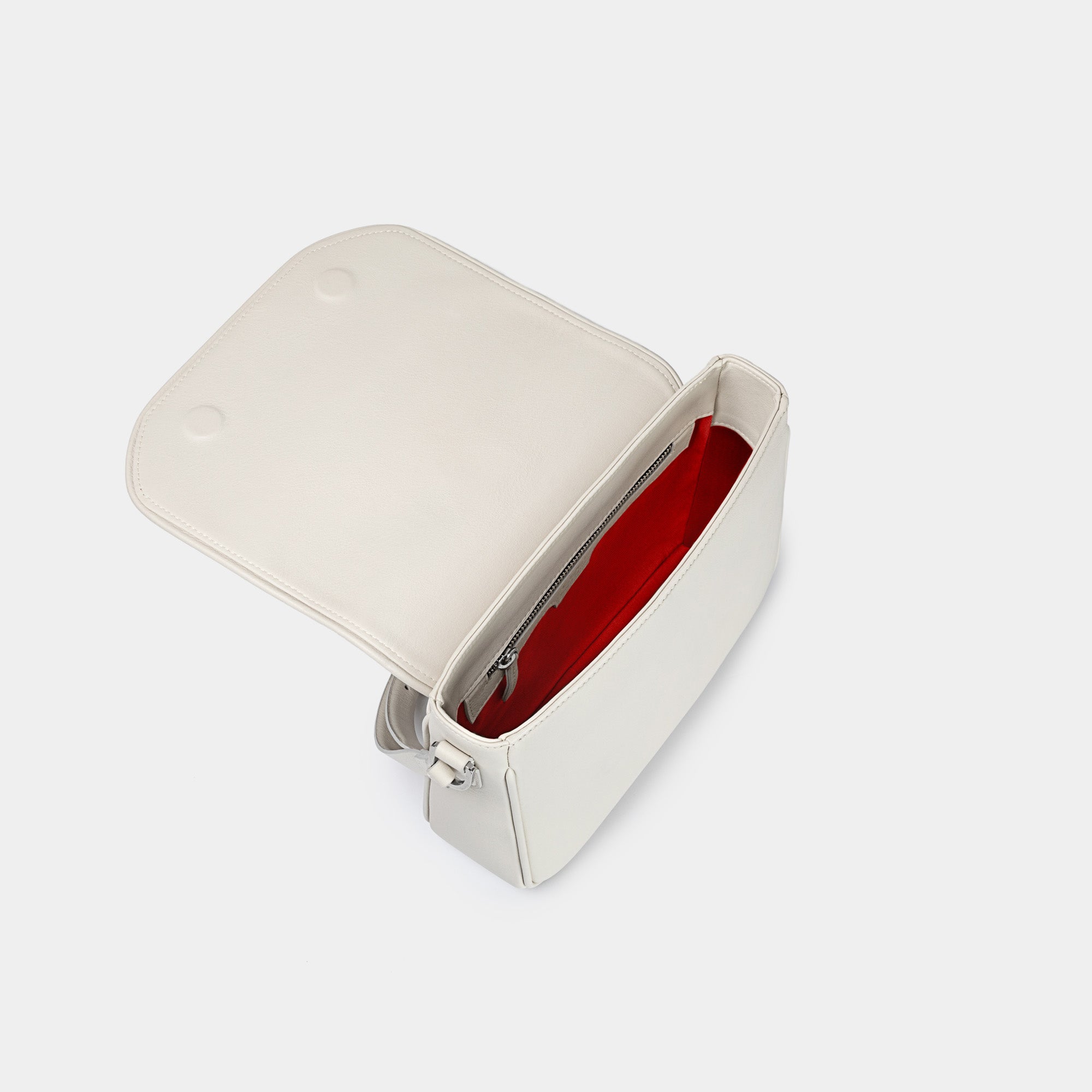 Bandolera pequeña en piel de vacuno en color blanco para mujer