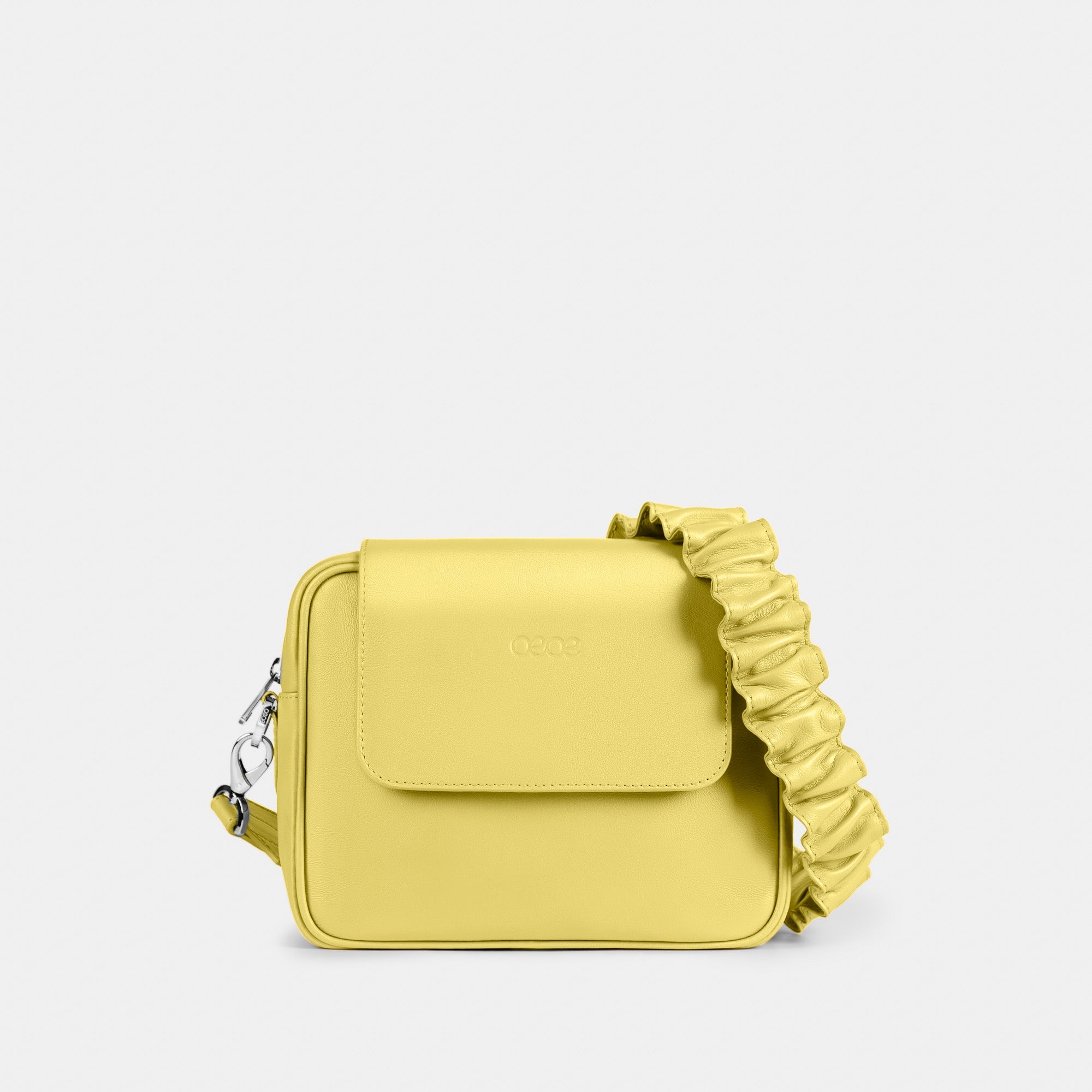 Bandolera pequeña en piel de vacuno en color amarillo para mujer