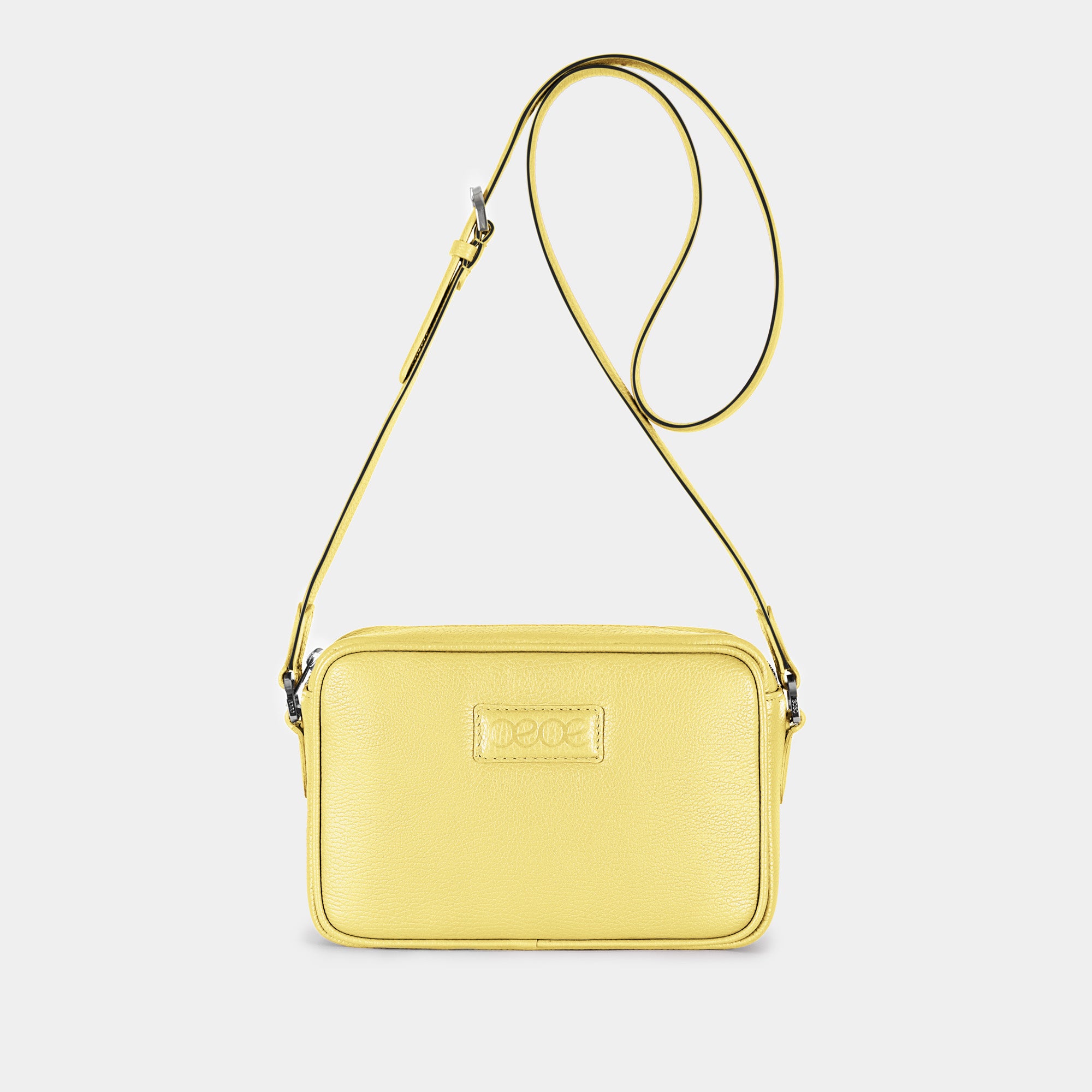 Bandolera pequeña en piel de vacuno en color amarillo para mujer