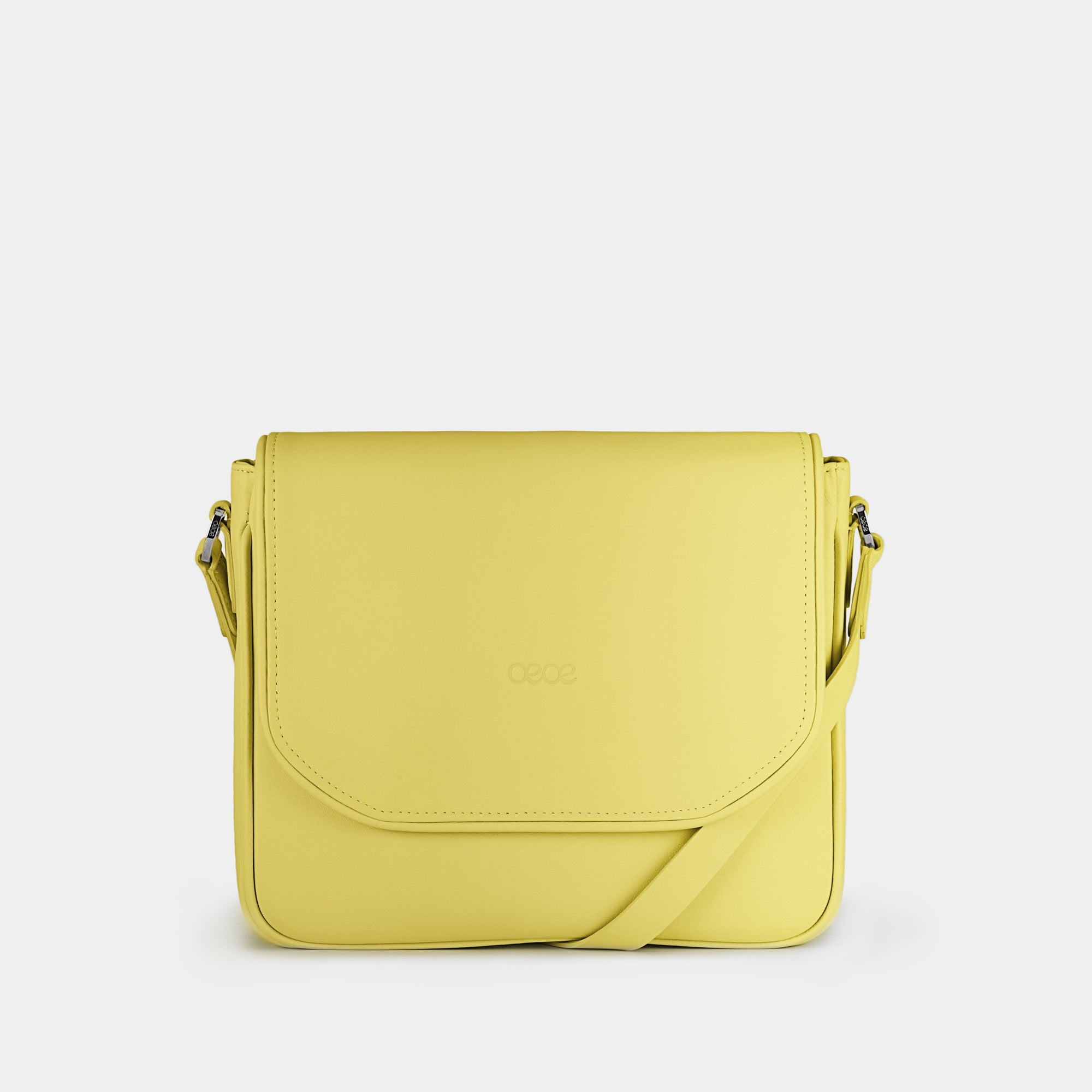 Bandolera pequeña en piel de vacuno en color amarillo para mujer