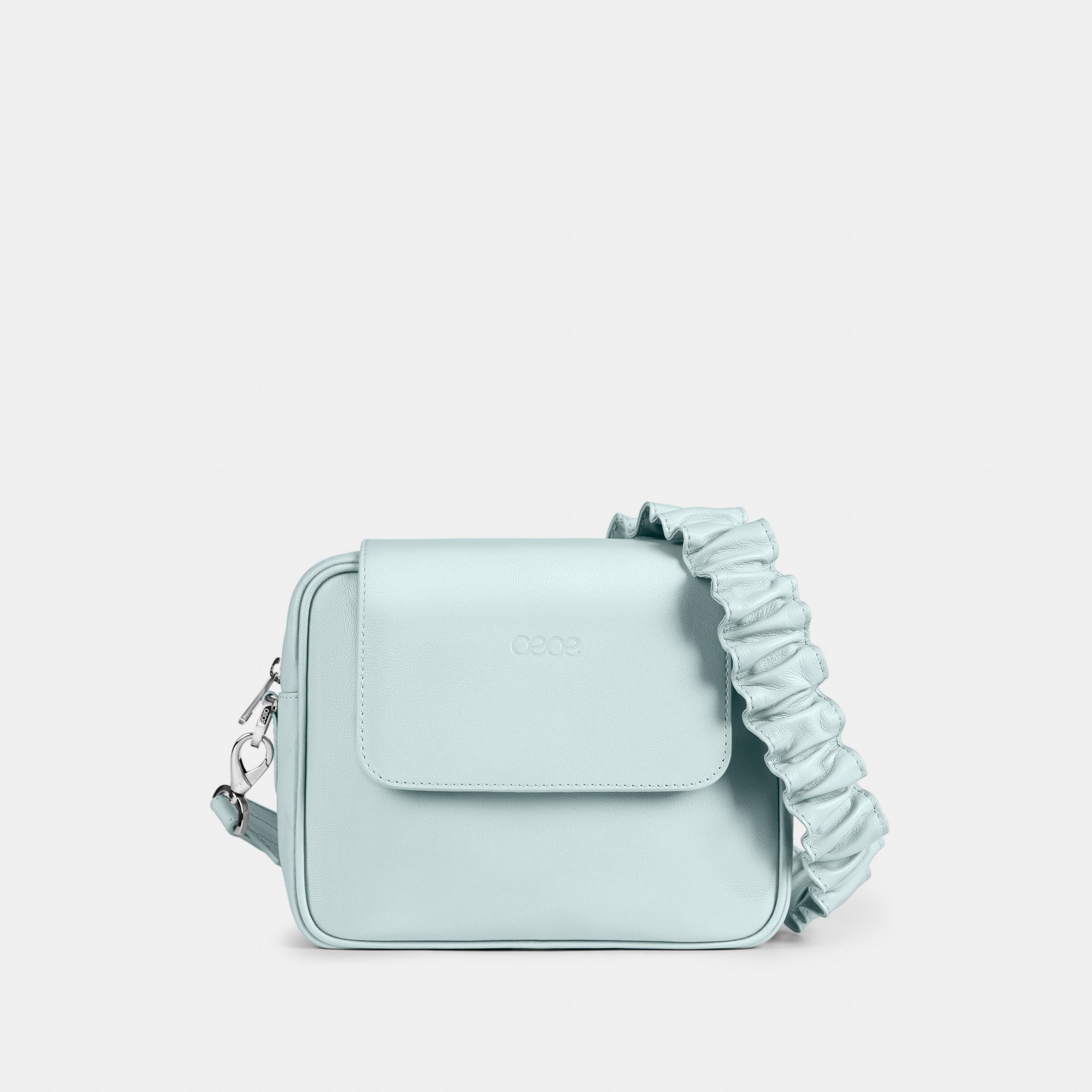 Bandolera pequeña en piel de vacuno en color azul (celeste) para mujer