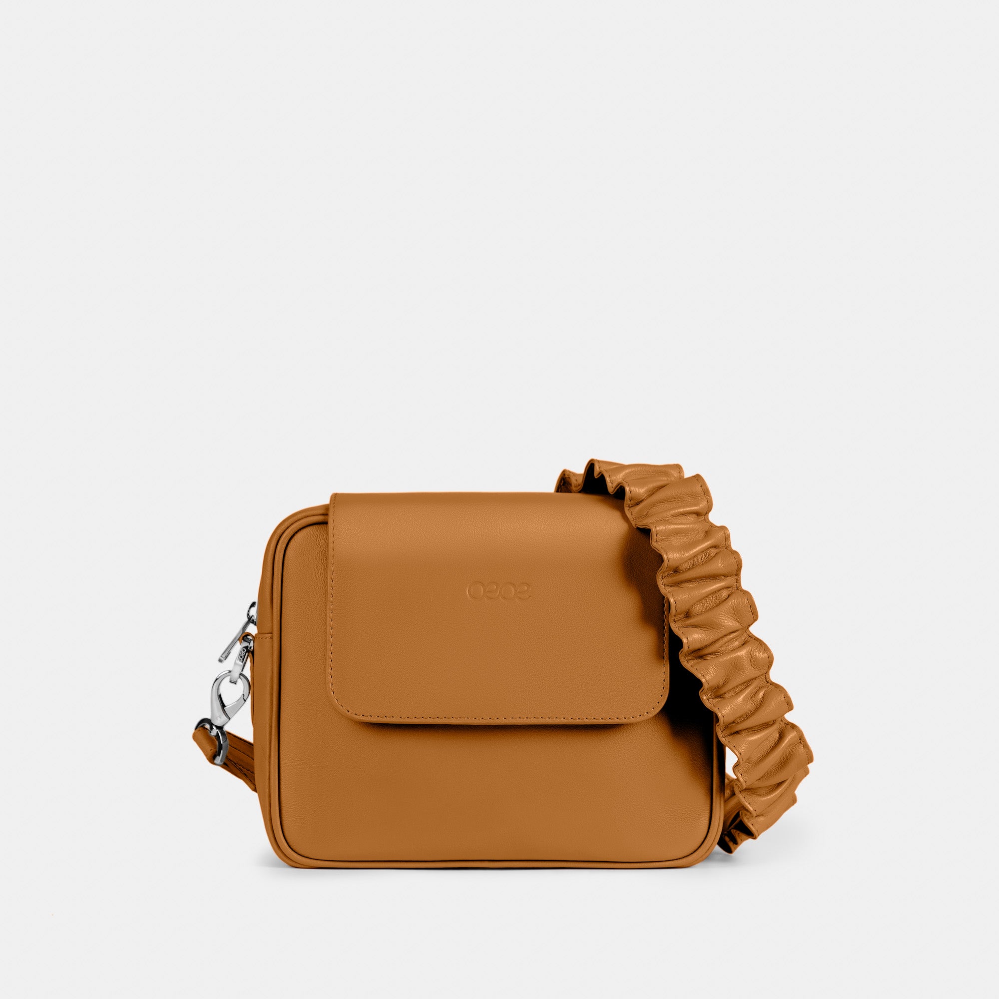 Bandolera pequeña en piel de vacuno en color camel para mujer