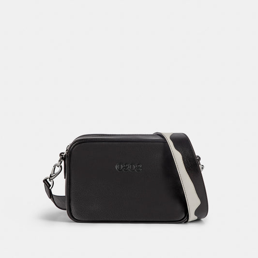 Bandolera pequeña en piel de vacuno en color negro/blanco para mujer