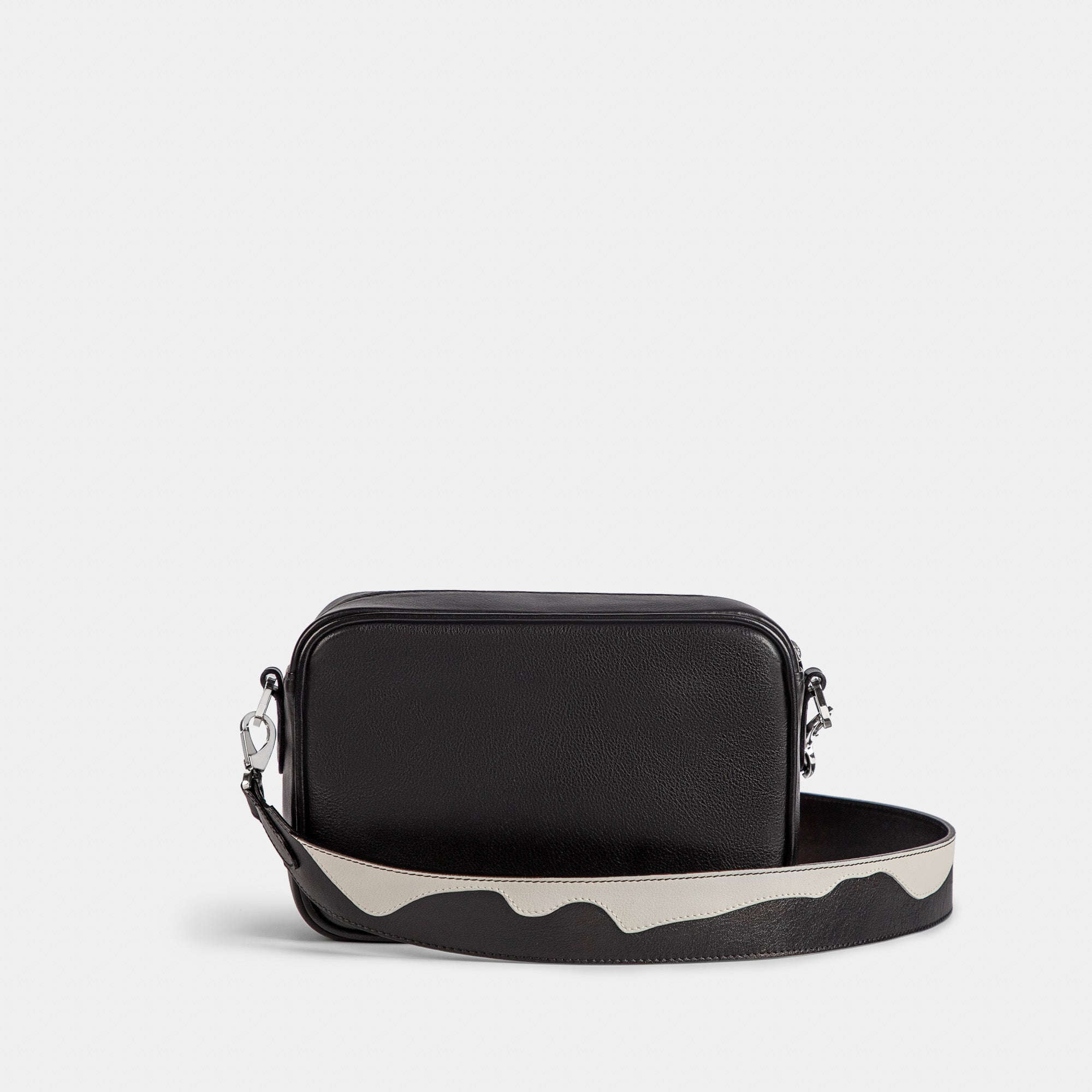 Bandolera pequeña en piel de vacuno en color negro/blanco para mujer