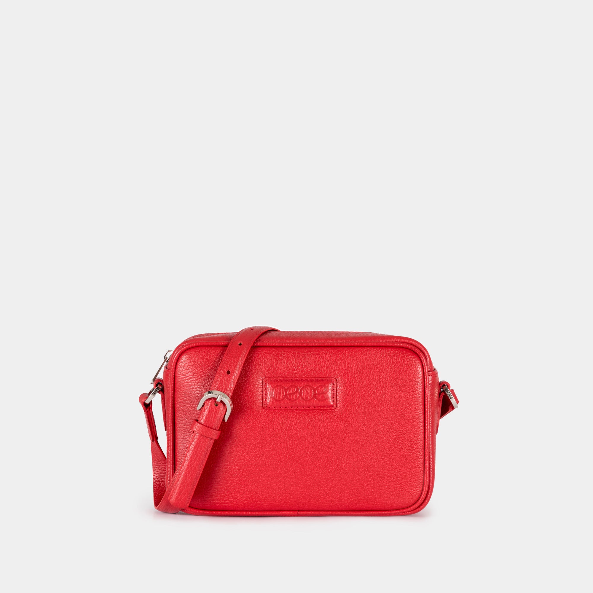 Bandolera pequeña en piel de vacuno en color rojo para mujer