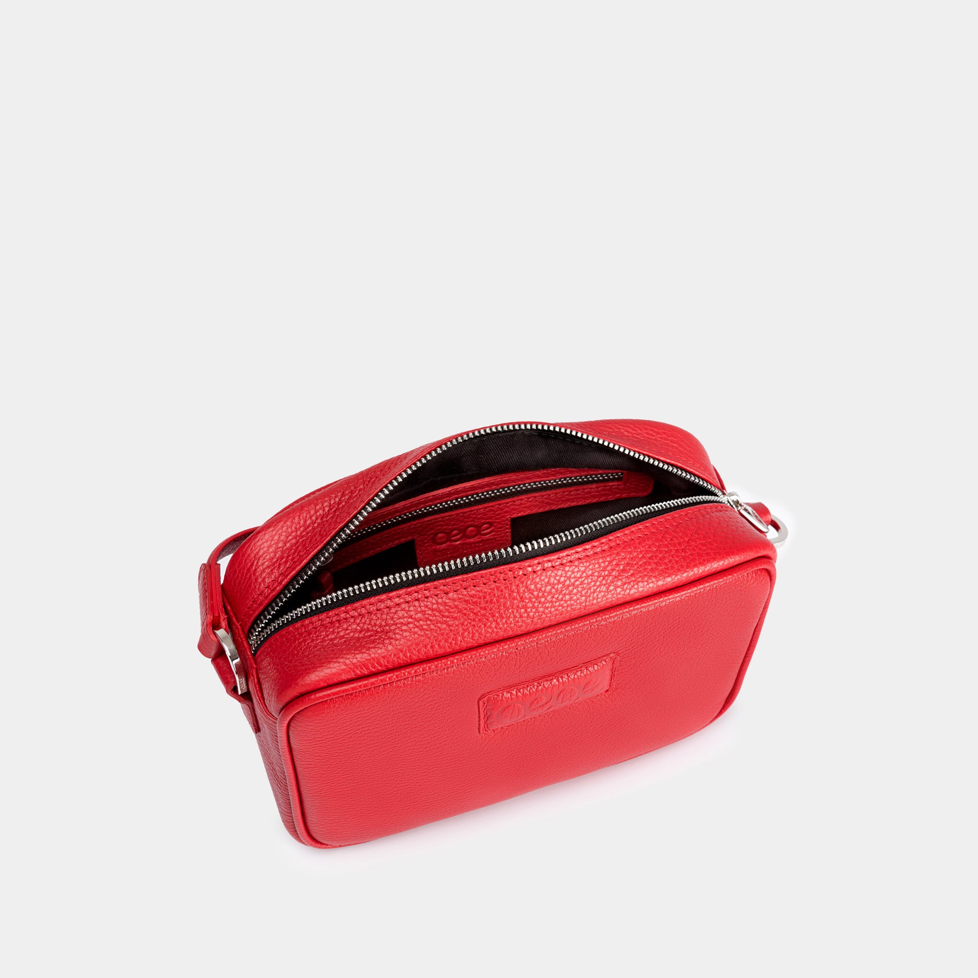 Bandolera pequeña en piel de vacuno en color rojo para mujer