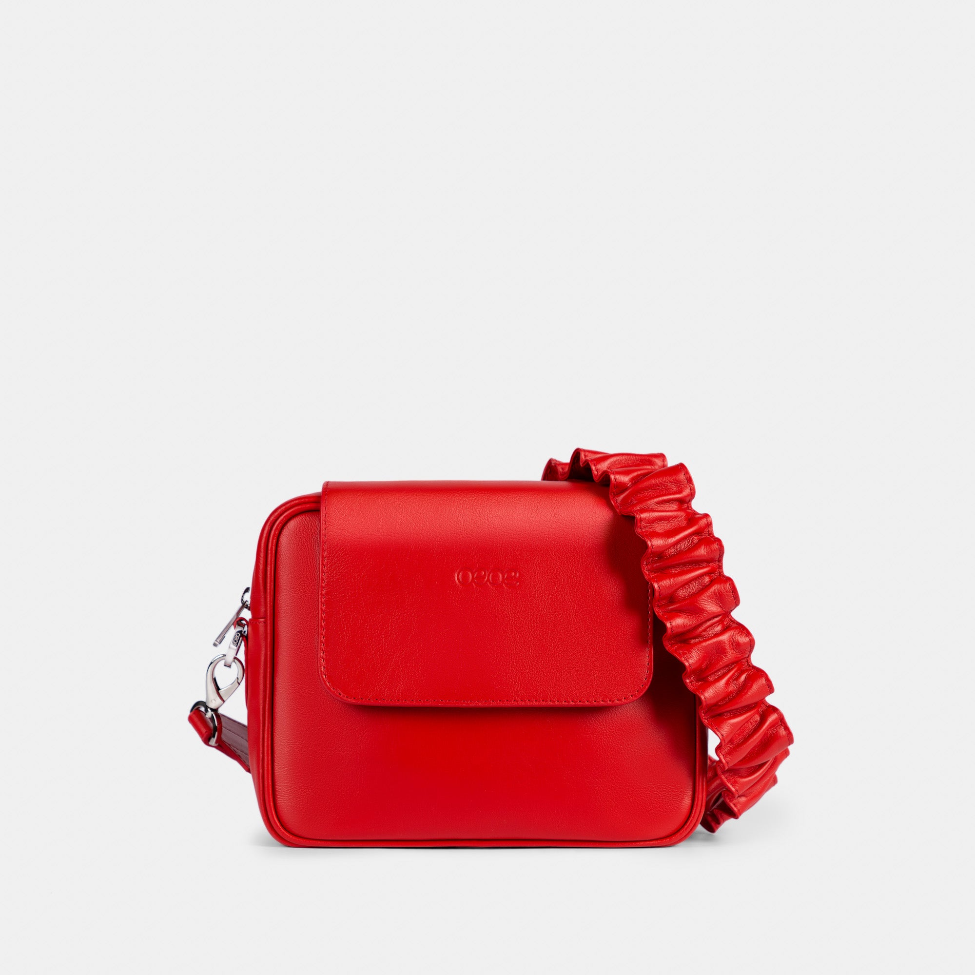 Bandolera pequeña en piel de vacuno en color rojo para mujer