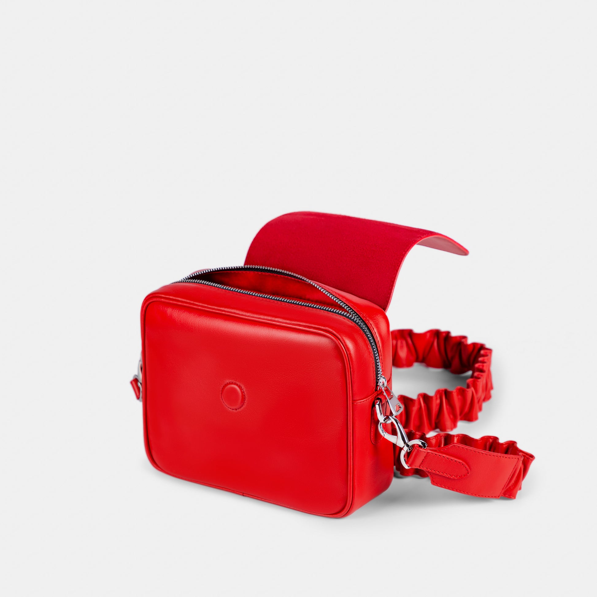 Bandolera pequeña en piel de vacuno en color rojo para mujer