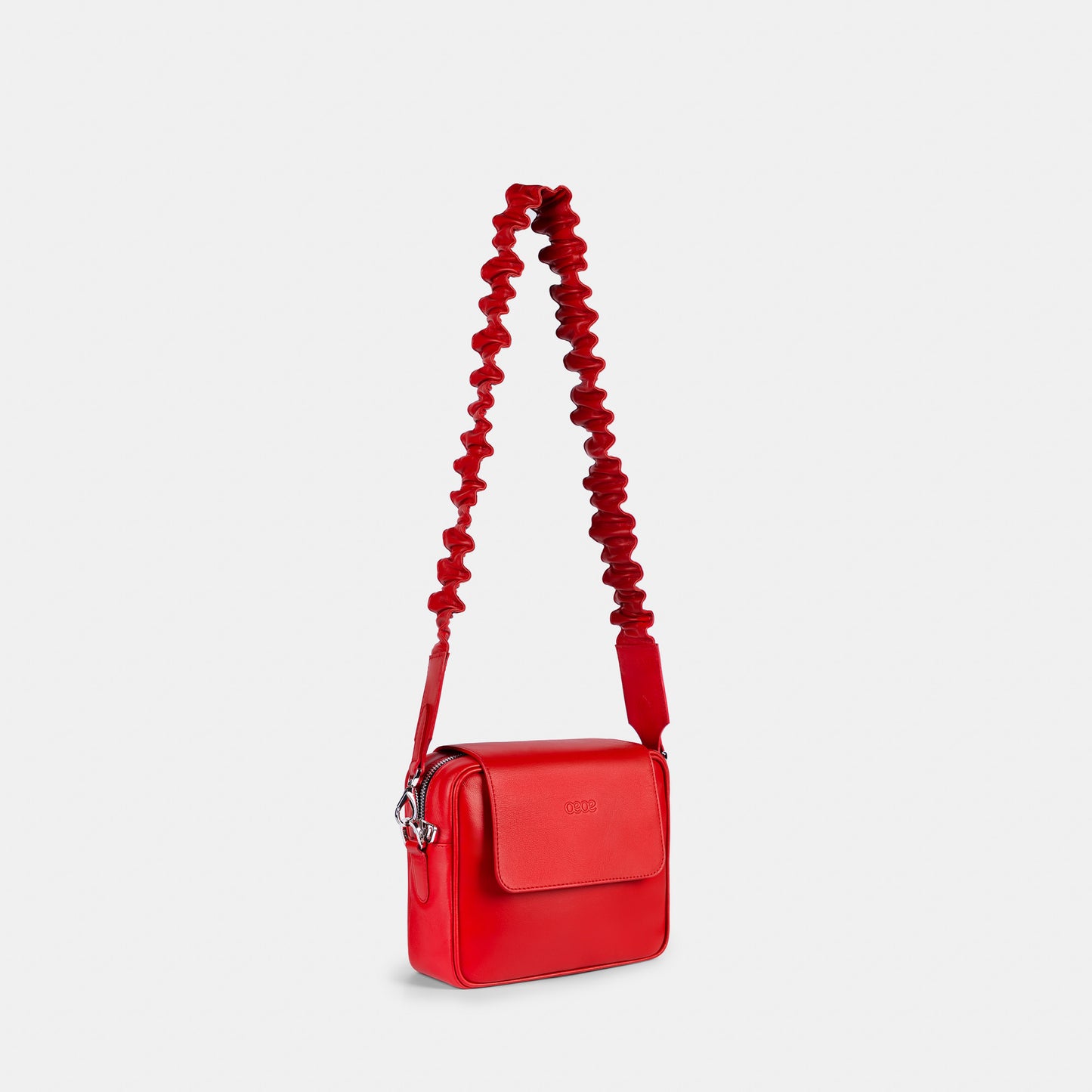 Bandolera pequeña en piel de vacuno en color rojo para mujer
