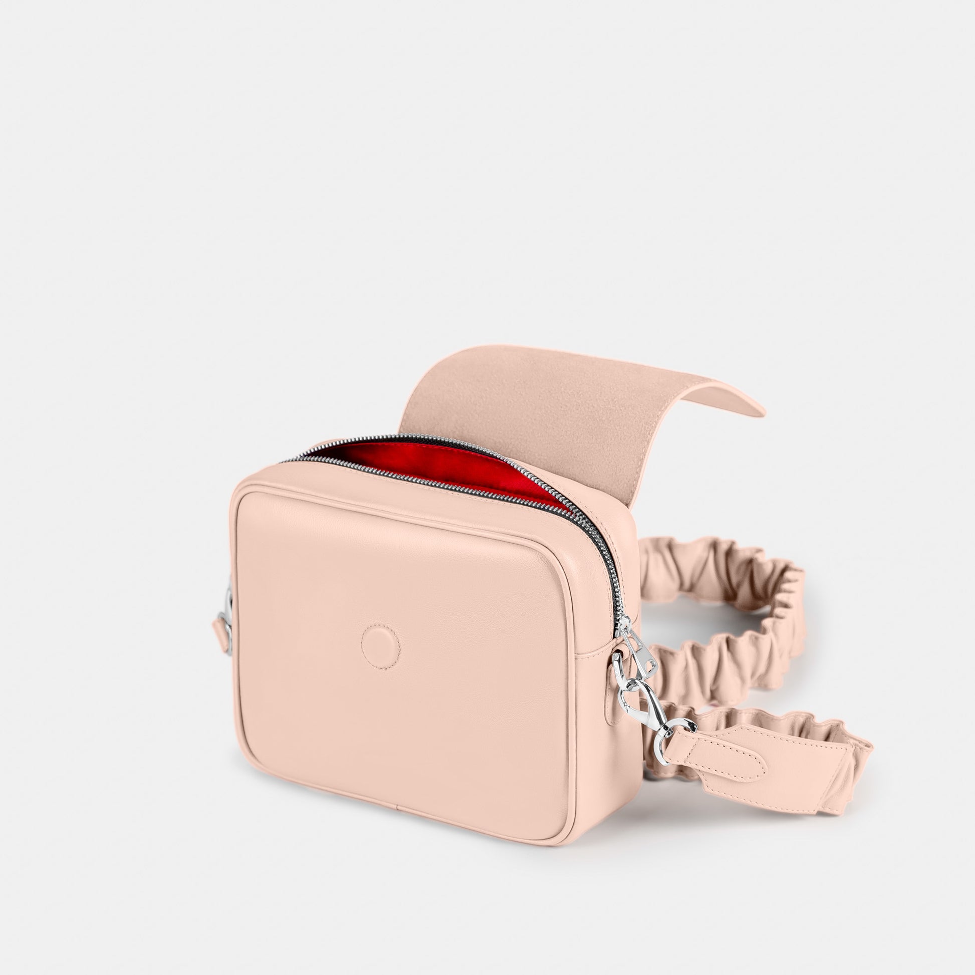 Bandolera pequeña en piel de vacuno en color rosa para mujer