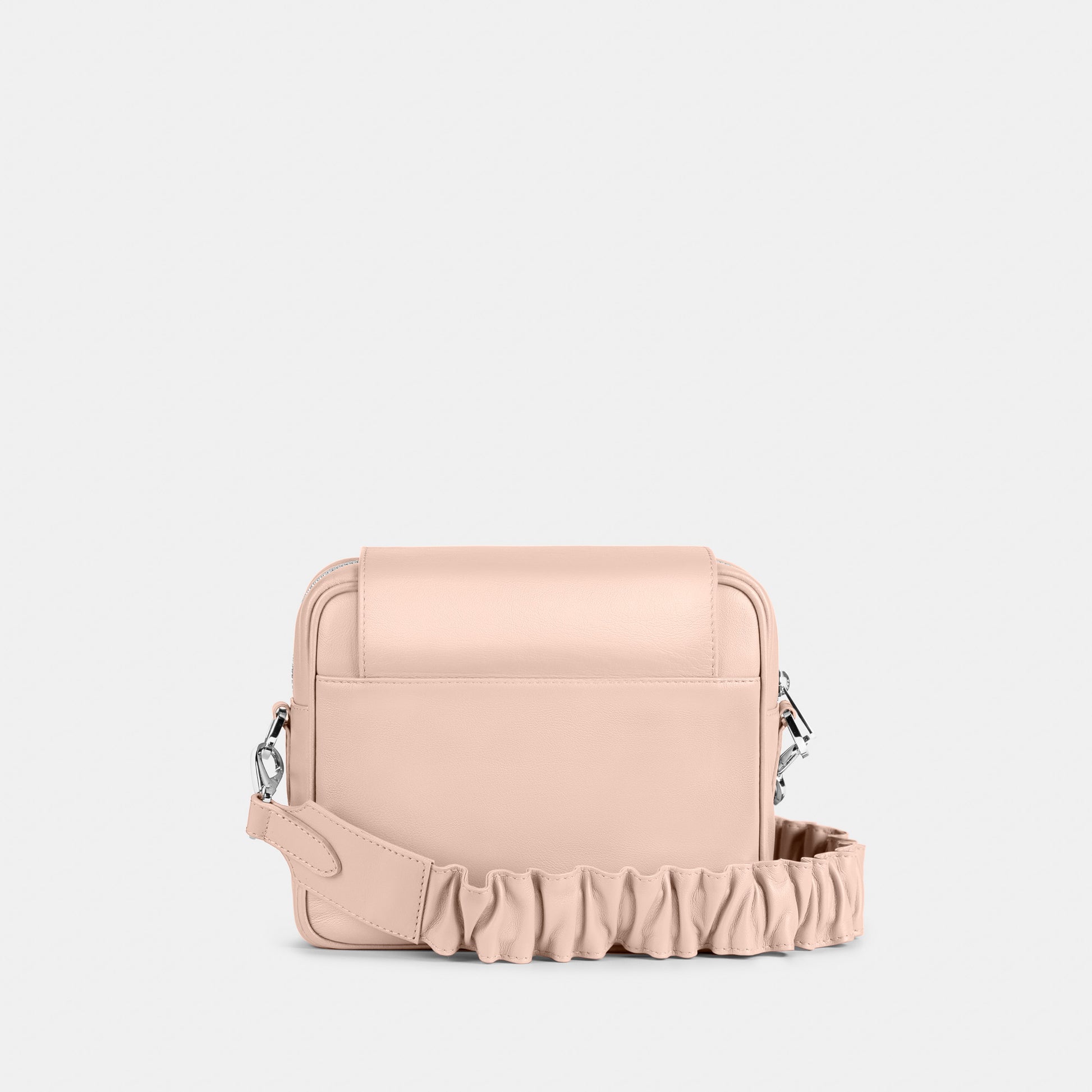 Bandolera pequeña en piel de vacuno en color rosa para mujer