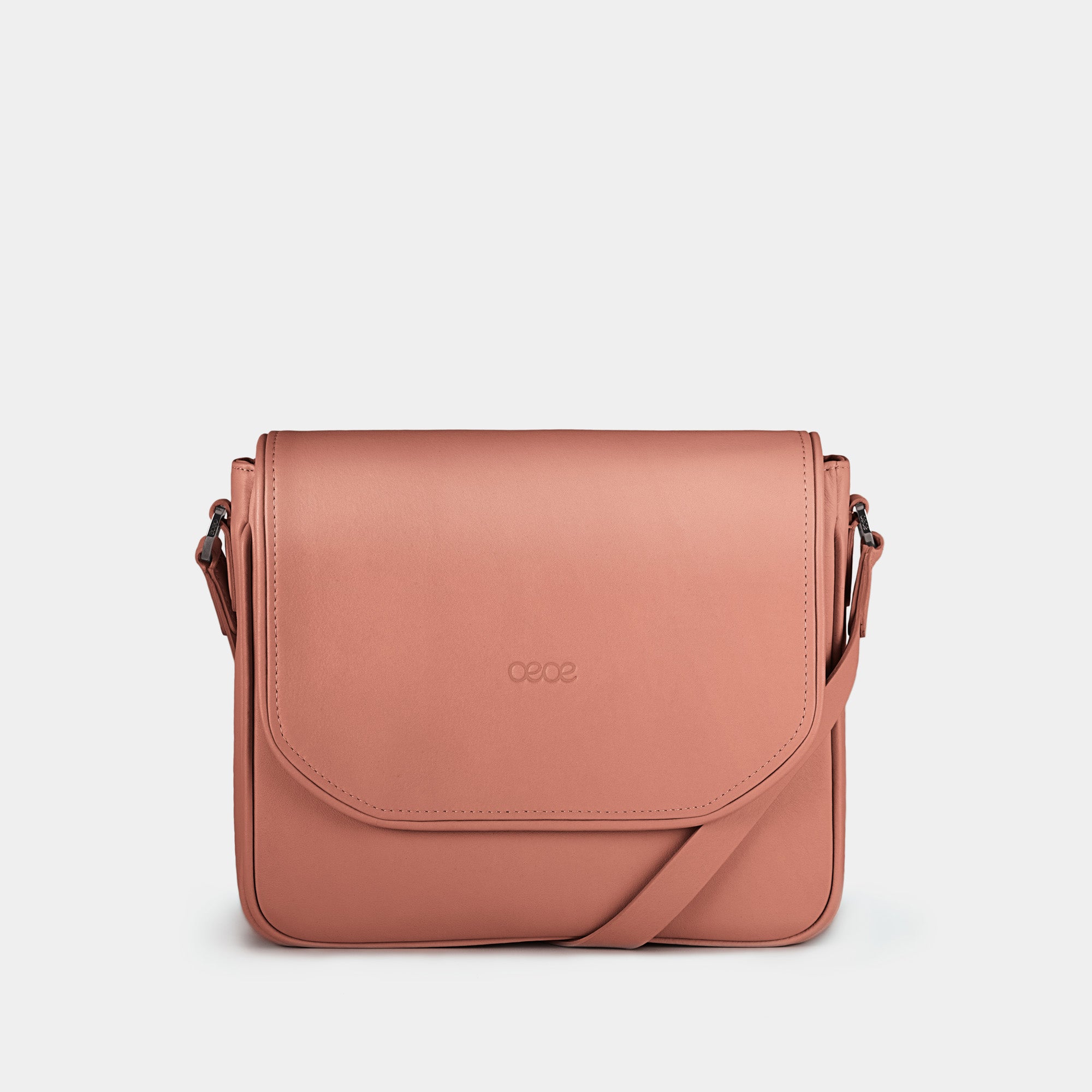 Bandolera pequeña en piel de vacuno en color rosa para mujer