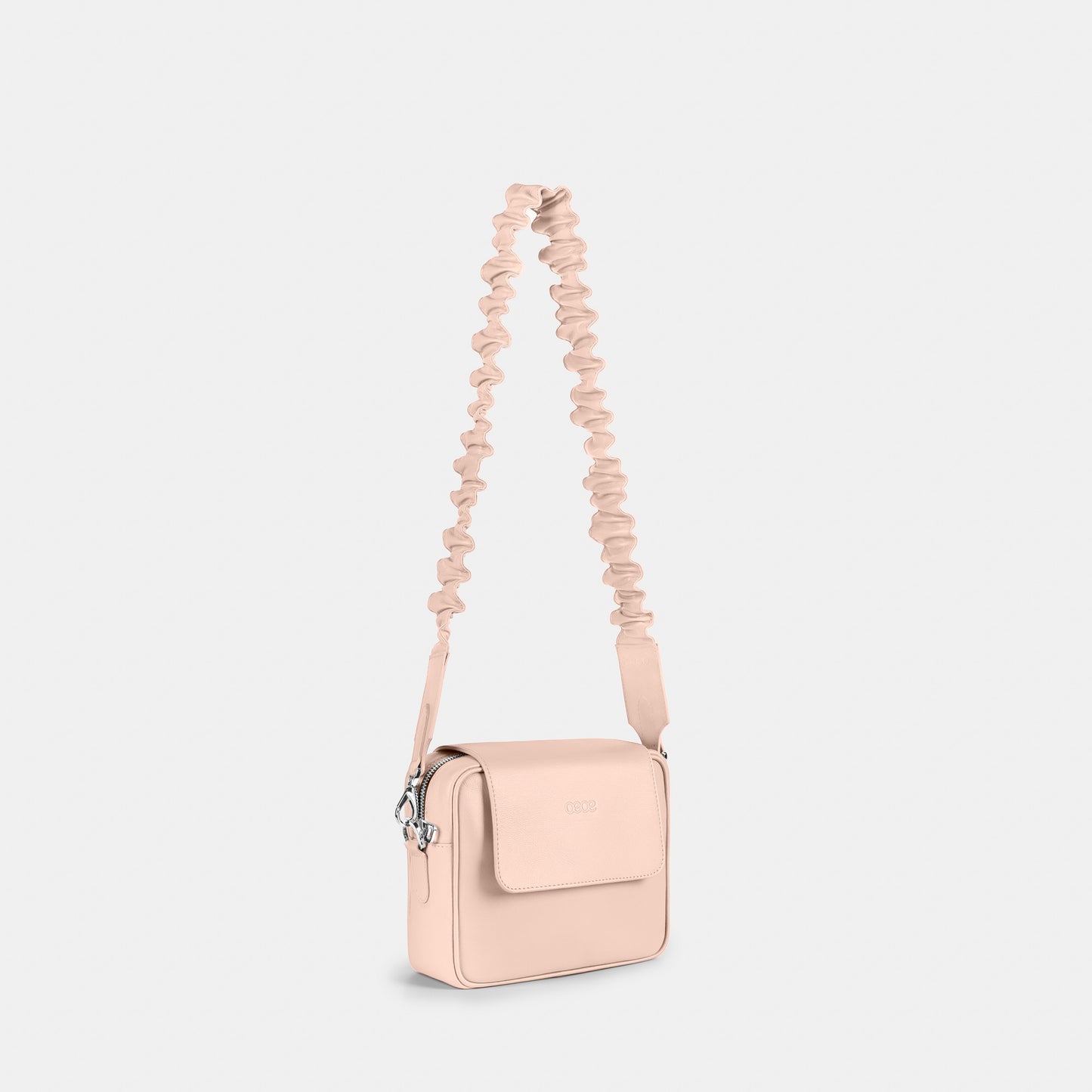 Bandolera pequeña en piel de vacuno en color rosa para mujer
