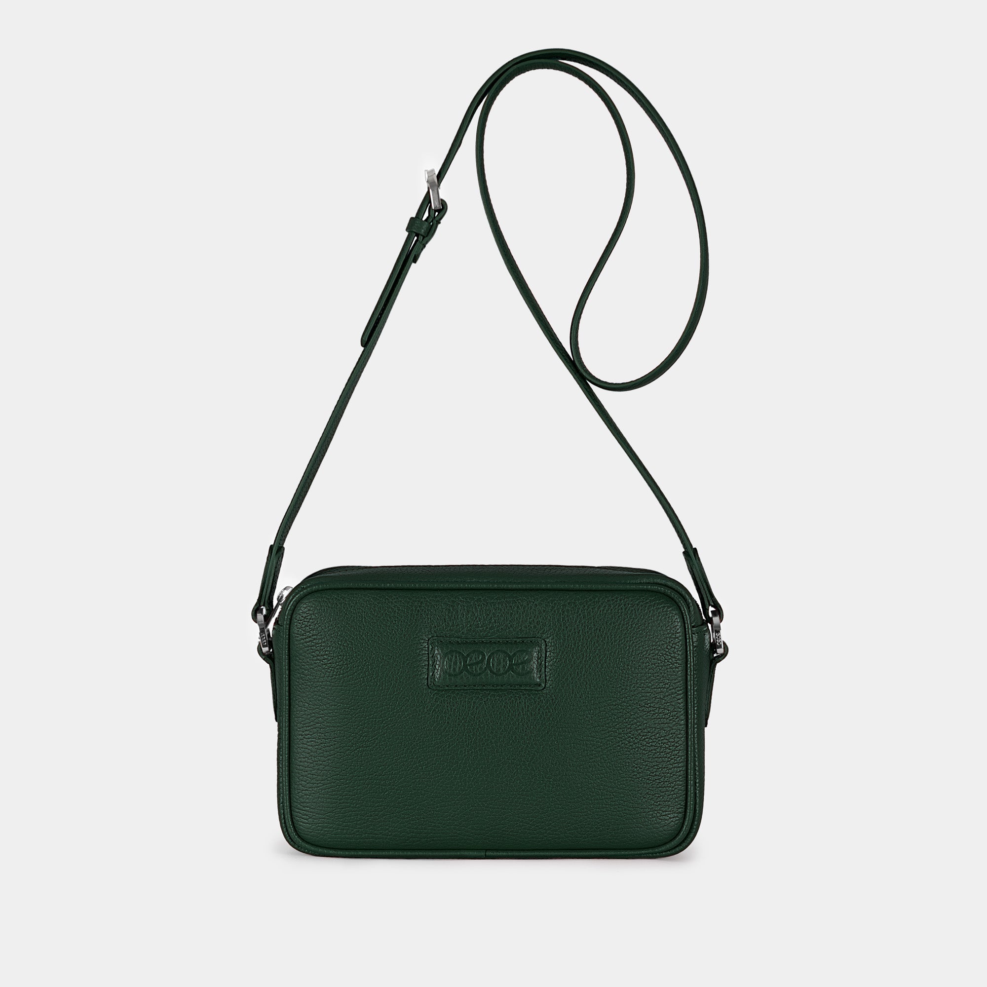 Bandolera pequeña en piel de vacuno en color verde para mujer