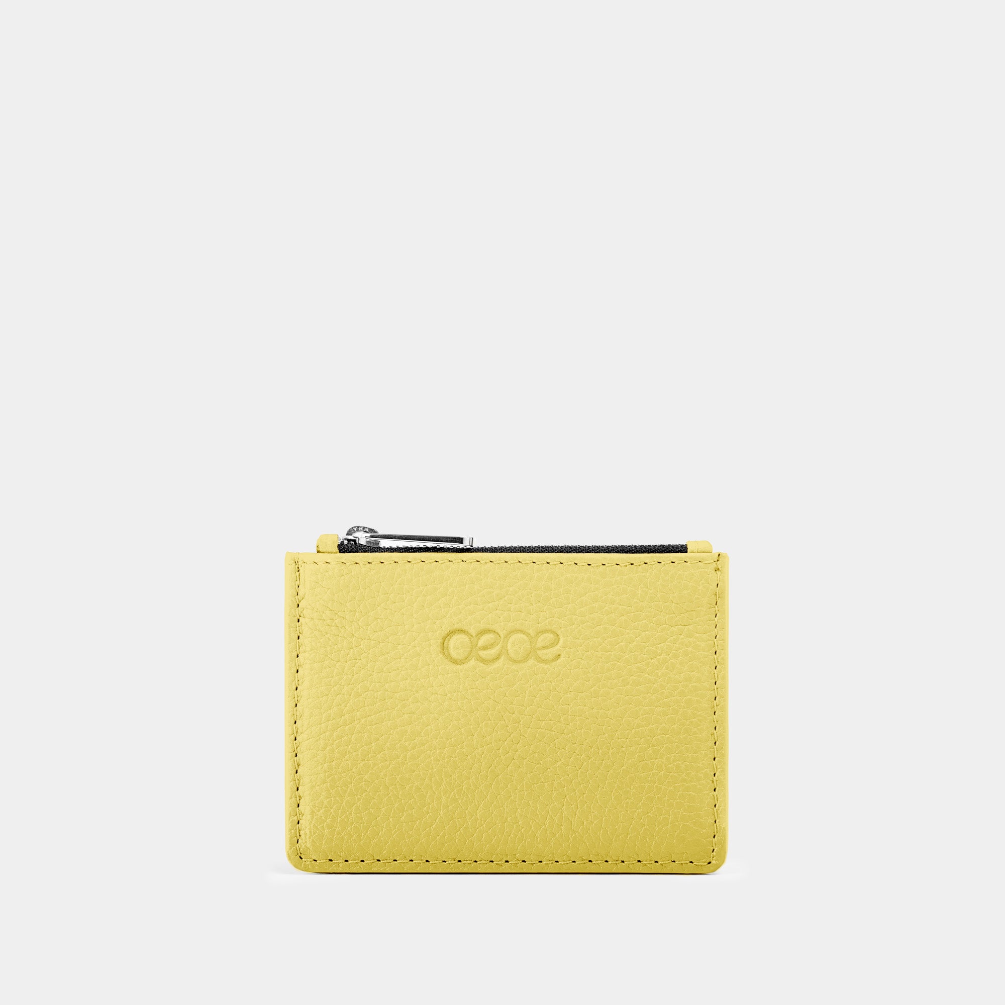 Cartera pequeña en piel de vacuno  en color amarillo para mujer
