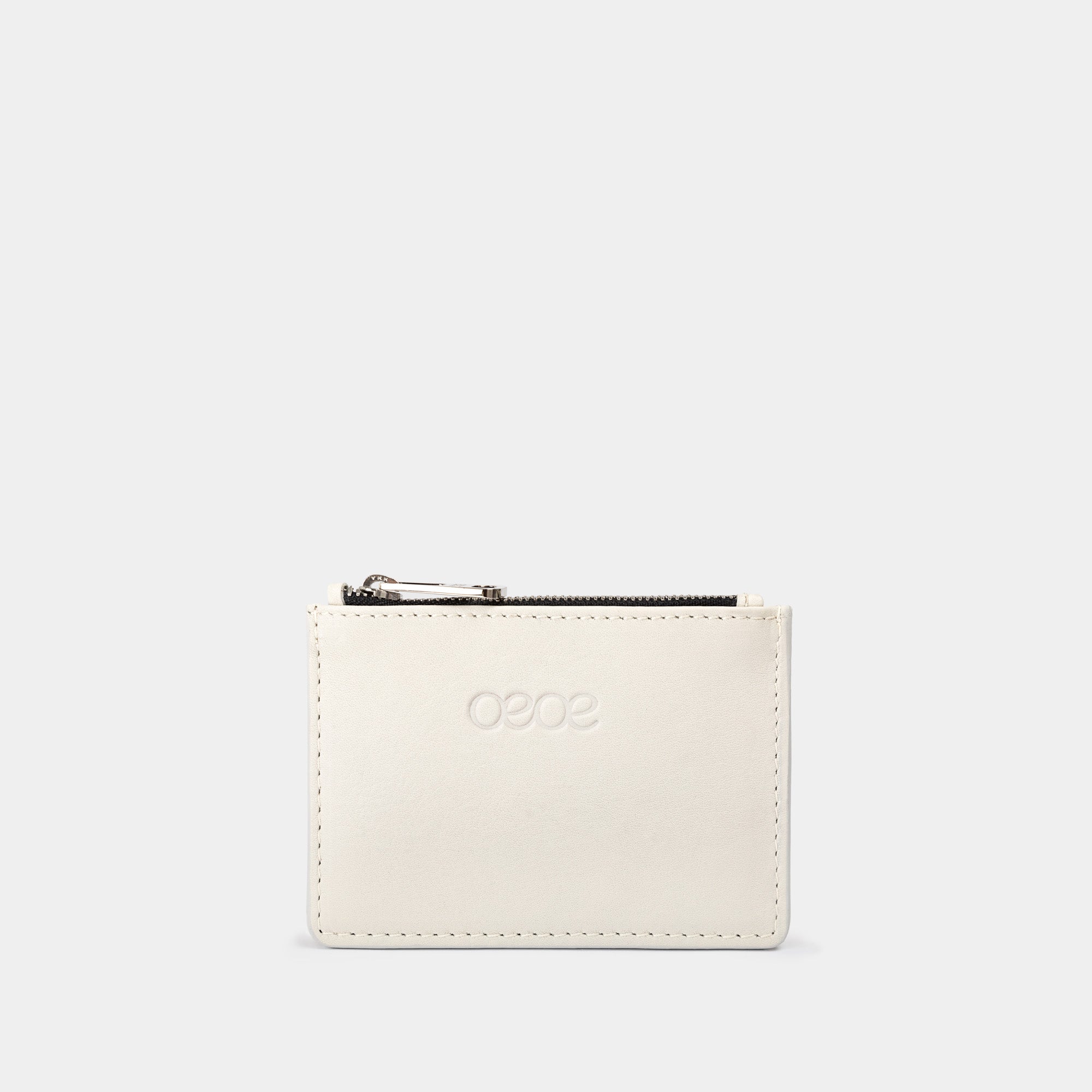 Cartera pequeña en piel de vacuno en color blanco para mujer