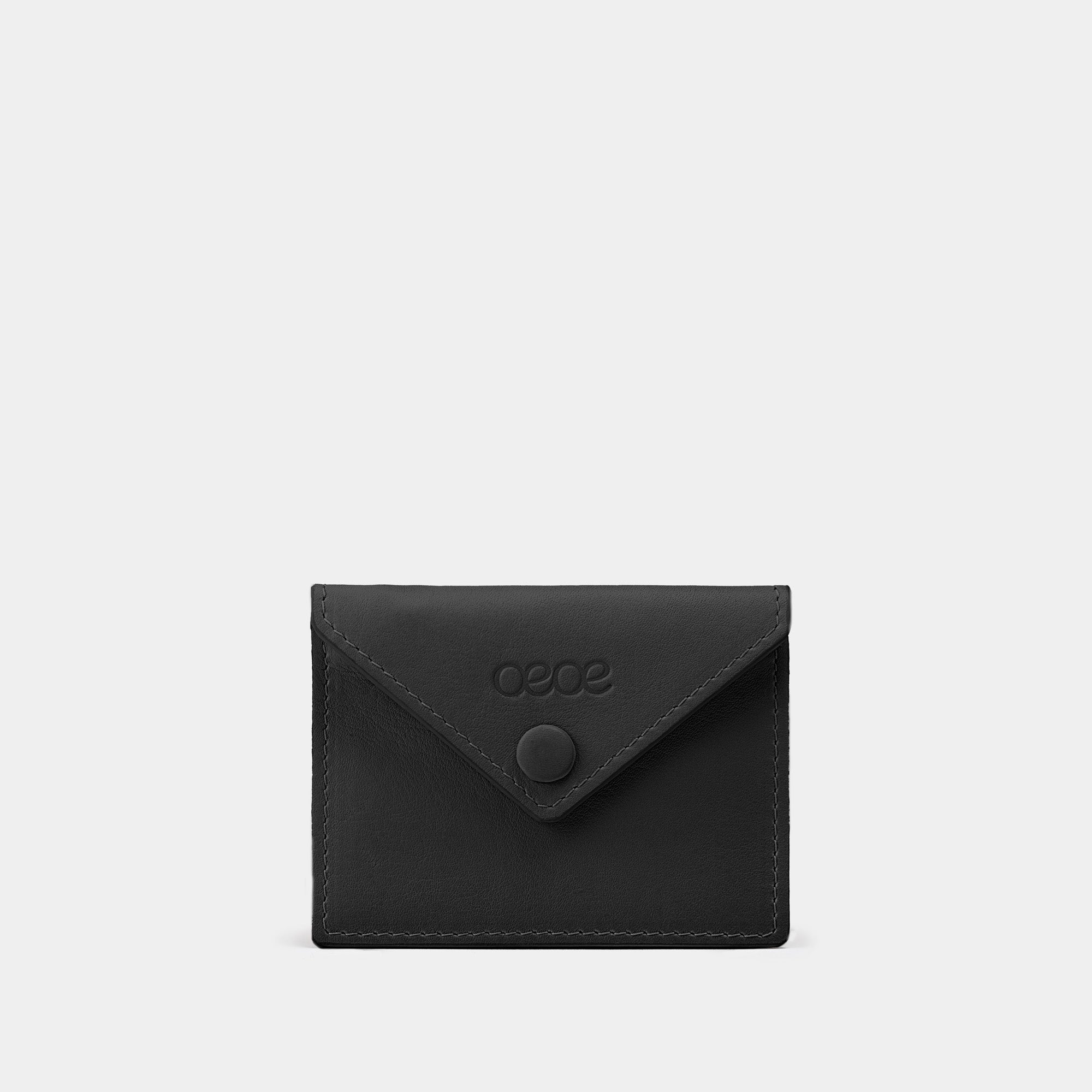 Cartera pequeña en piel de vacuno en color negro para mujer