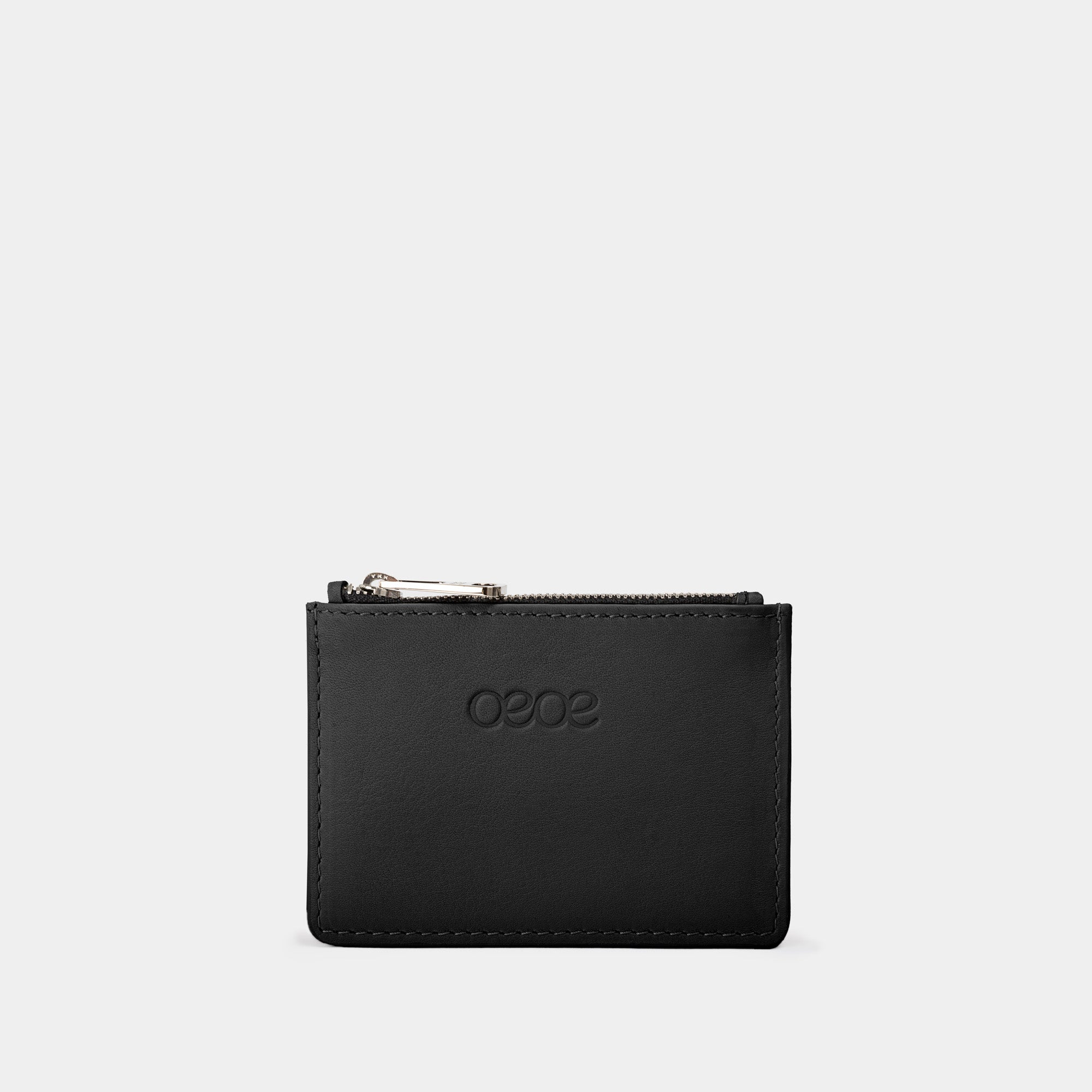 Cartera pequeña en piel de vacuno en color negro para mujer