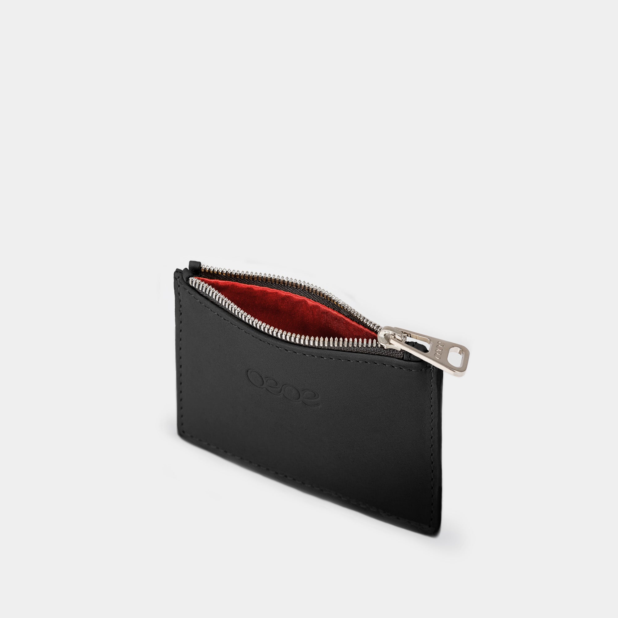 Cartera pequeña en piel de vacuno en color negro para mujer