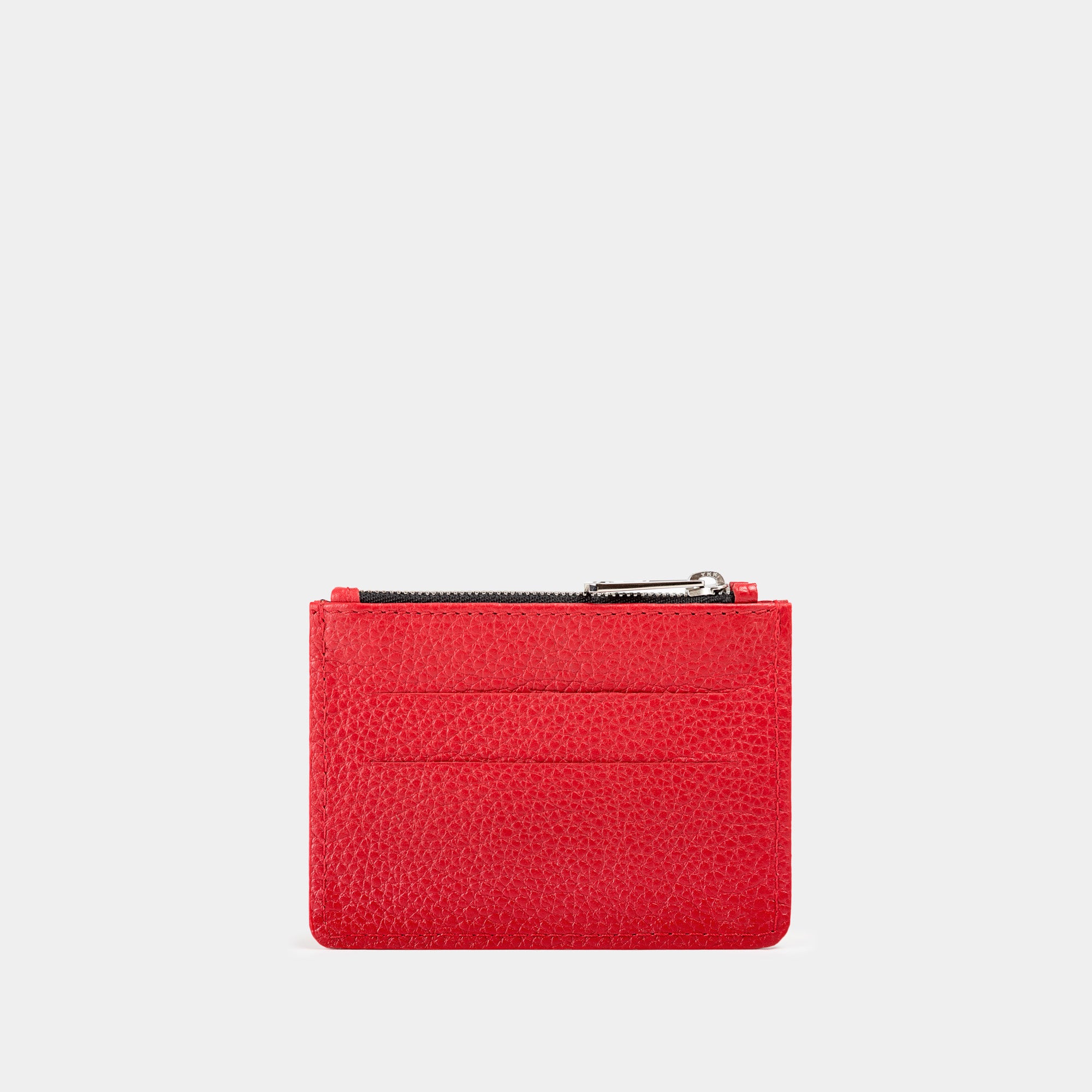 Cartera pequeña en piel de vacuno  en color rojo para mujer