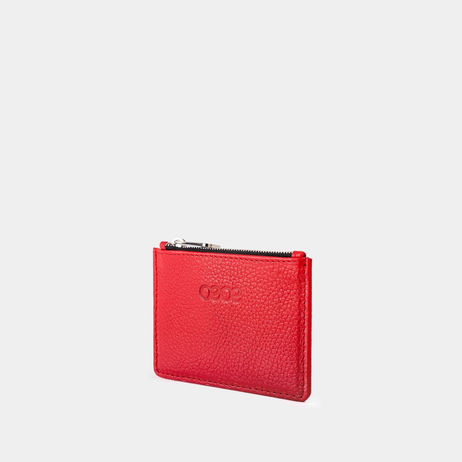 Cartera pequeña en piel de vacuno  en color rojo para mujer
