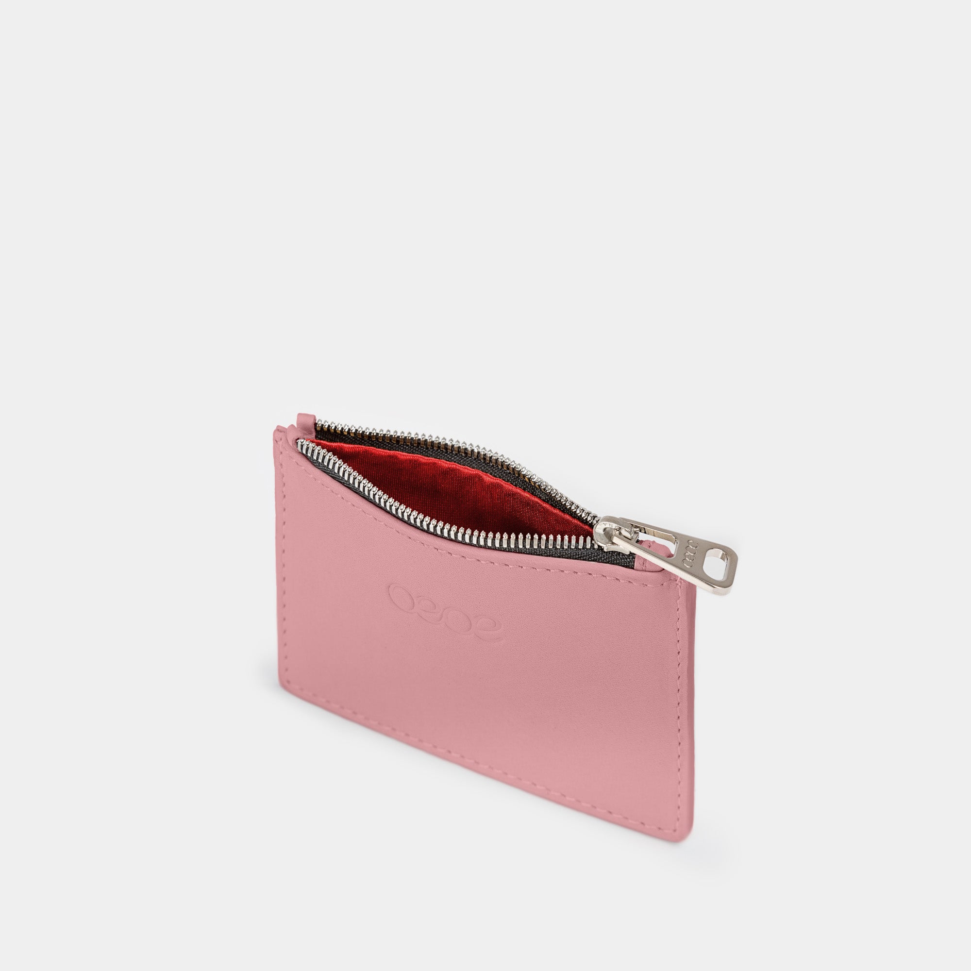 Cartera pequeña en piel de vacuno en color rosa para mujer