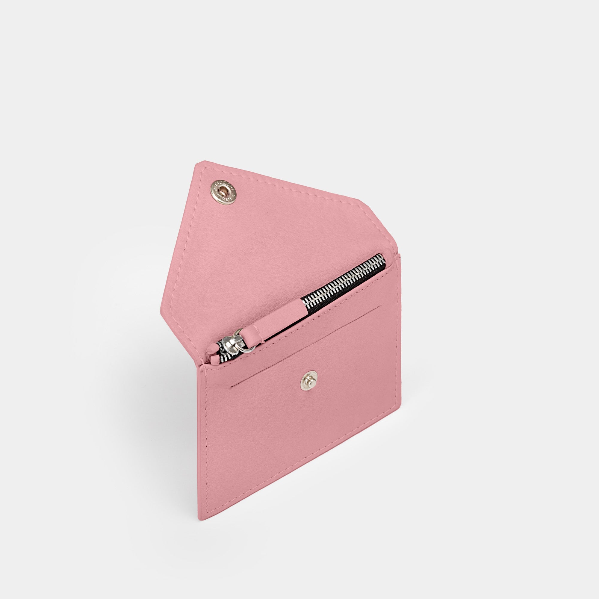 Cartera pequeña en piel de vacuno en color rosa para mujer
