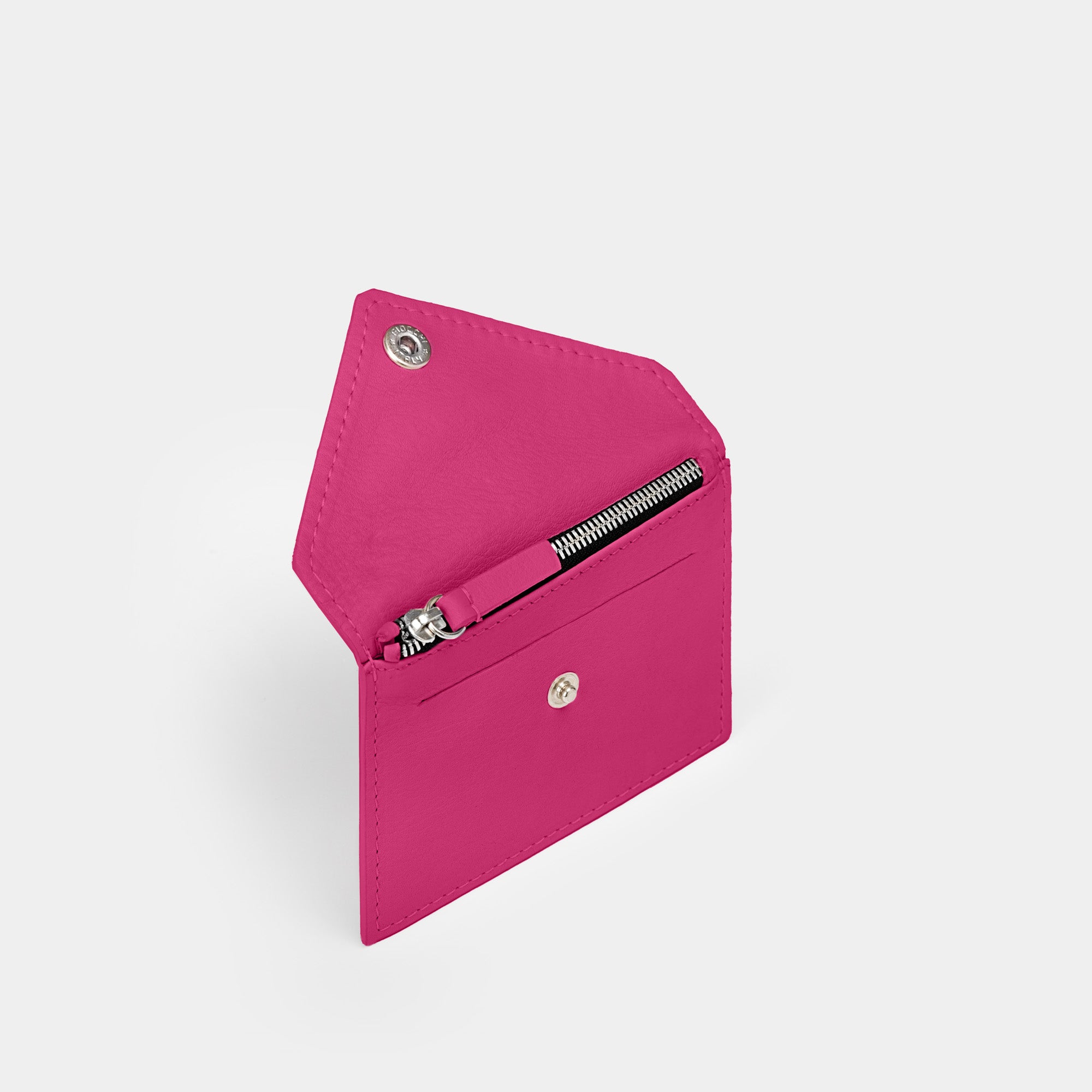 Cartera pequeña en piel de vacuno en color rosa para mujer