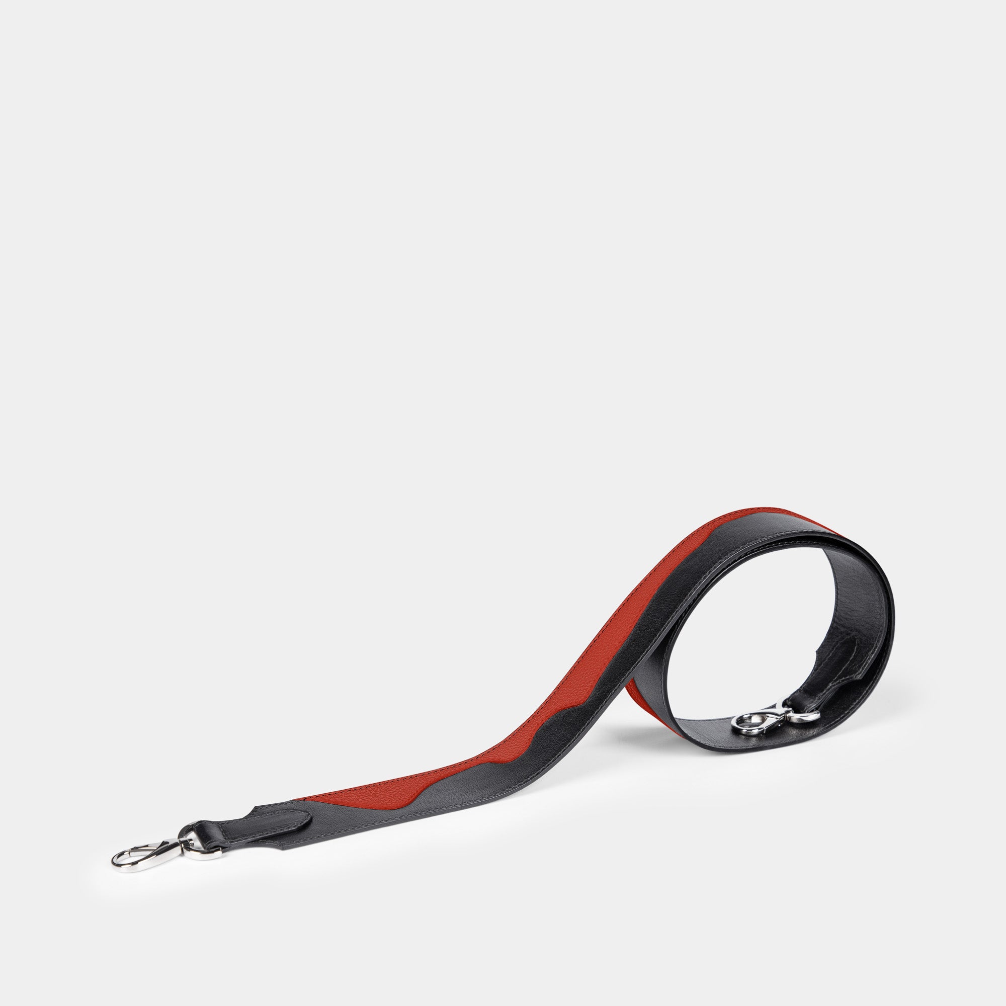 Correa Bolso  en piel de vacuno en color negra/naranja para hombre